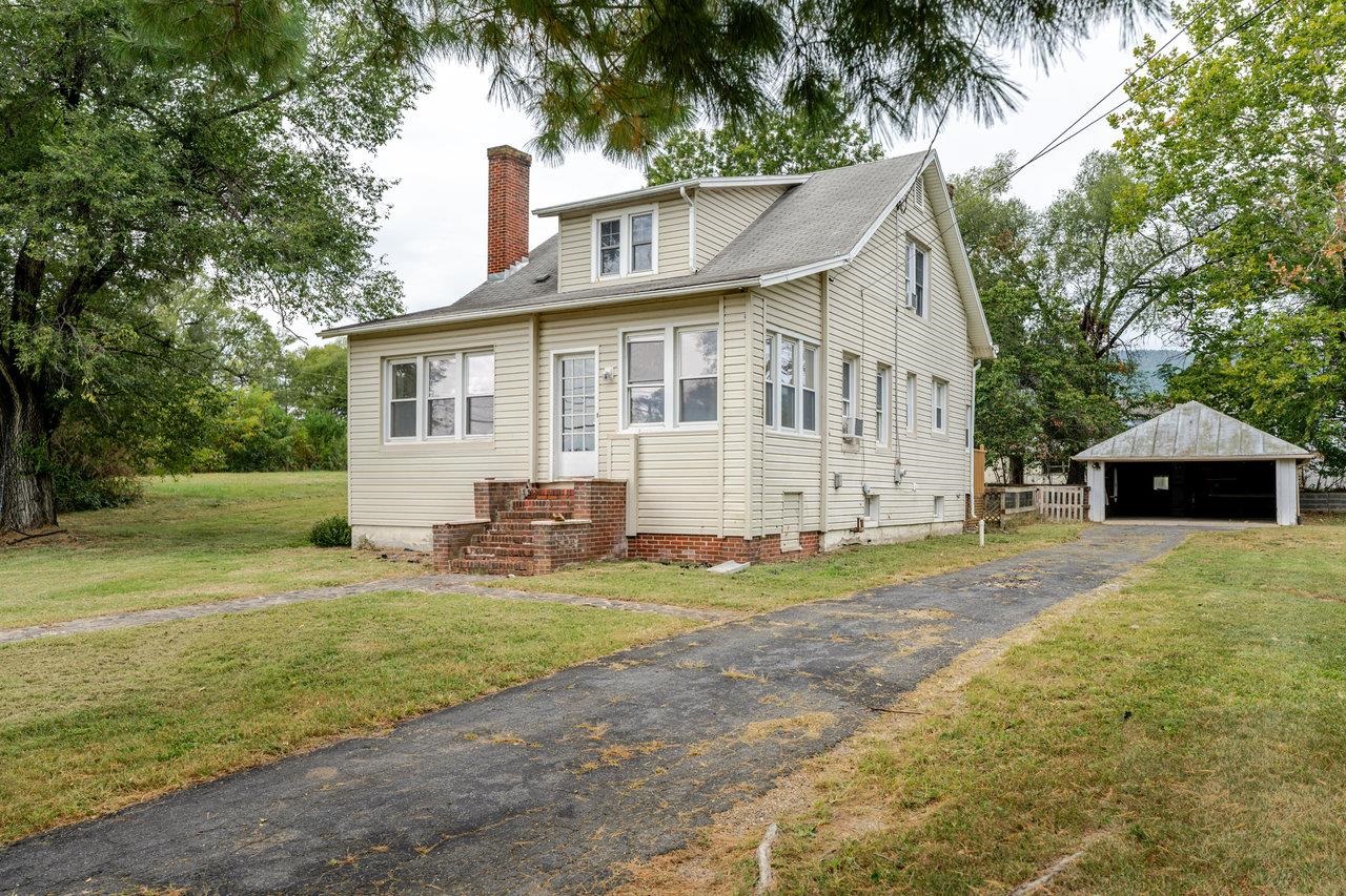 9571 Town Hall Road McGaheysville, VA 22840 - Photo 3 of 66 a view of a house with a yard and sitting area