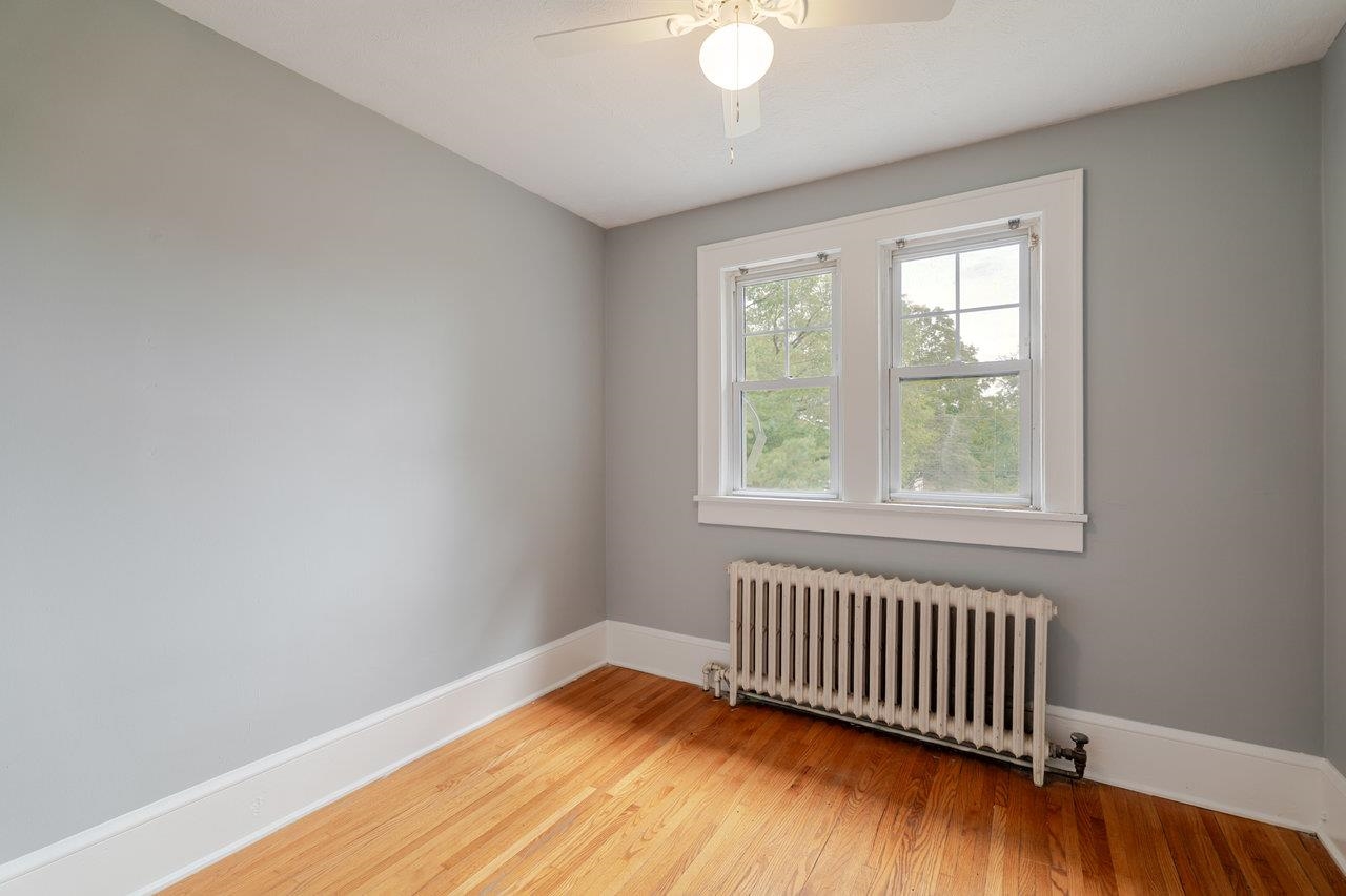 9571 Town Hall Road McGaheysville, VA 22840 - Photo 34 of 66 a view of empty room with wooden floor and fan