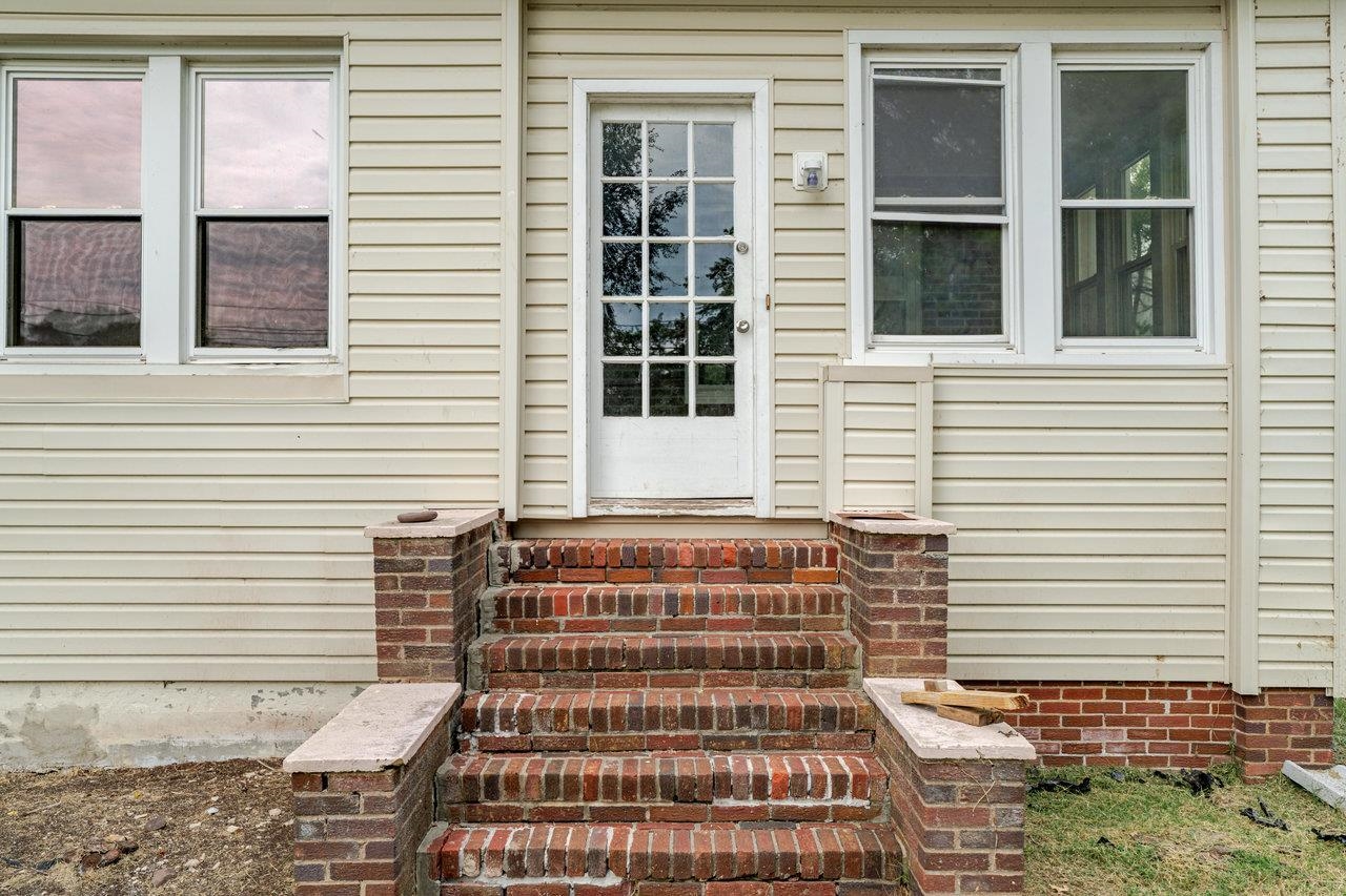9571 Town Hall Road McGaheysville, VA 22840 - Photo 4 of 66 a front view of a house with a yard