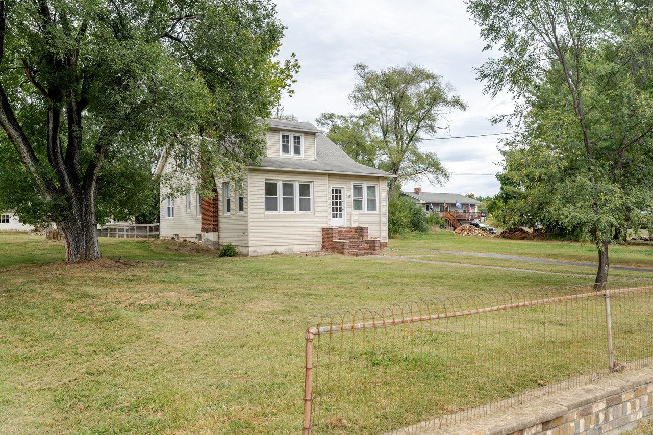 9571 Town Hall Road McGaheysville, VA 22840 - Photo 41 of 66 a front view of a house with a garden