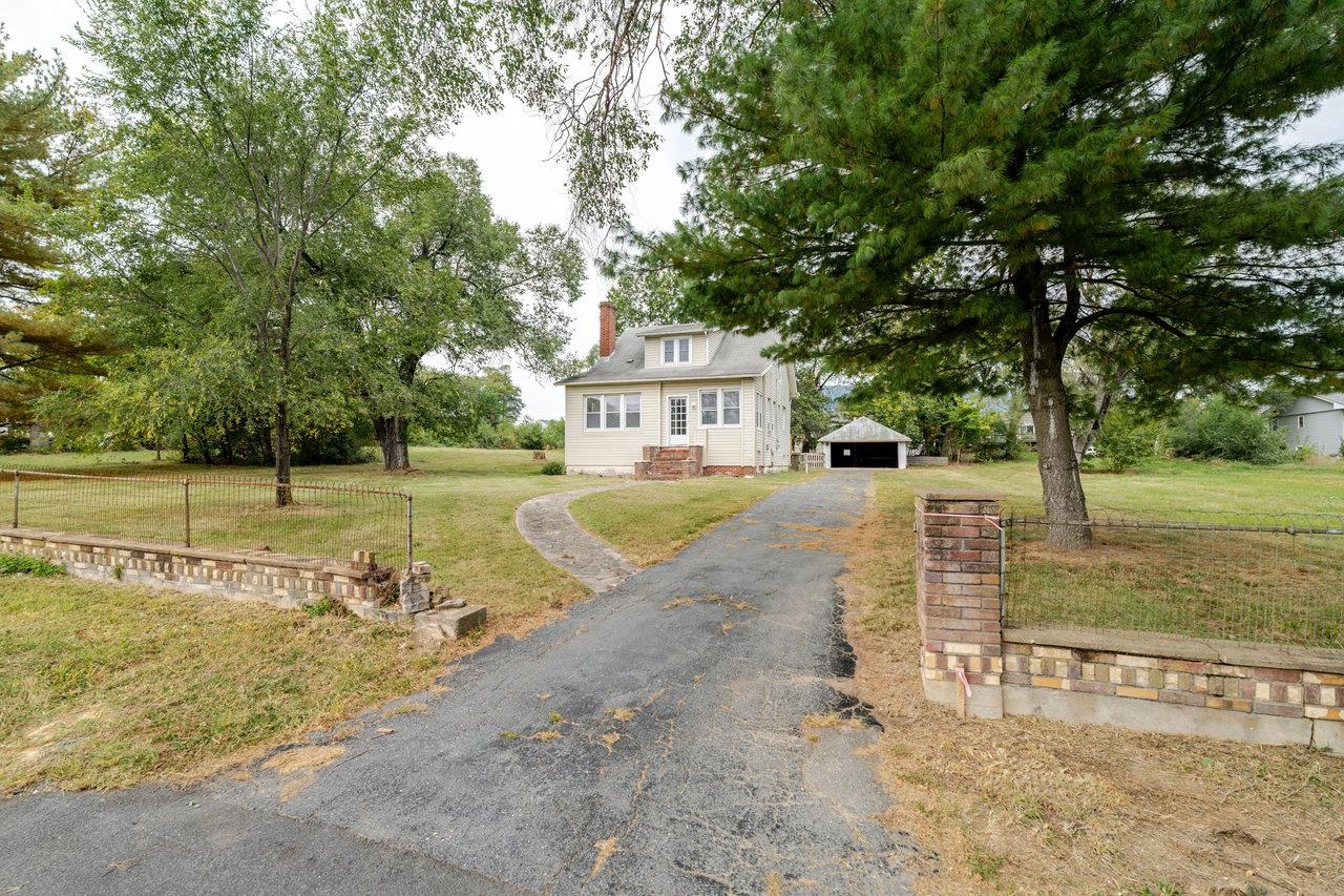 9571 Town Hall Road McGaheysville, VA 22840 - Photo 42 of 66 a view of a house with a yard