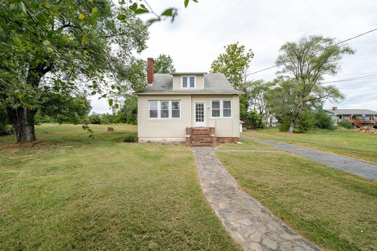 9571 Town Hall Road McGaheysville, VA 22840 - Photo 44 of 66 a front view of a house with a yard