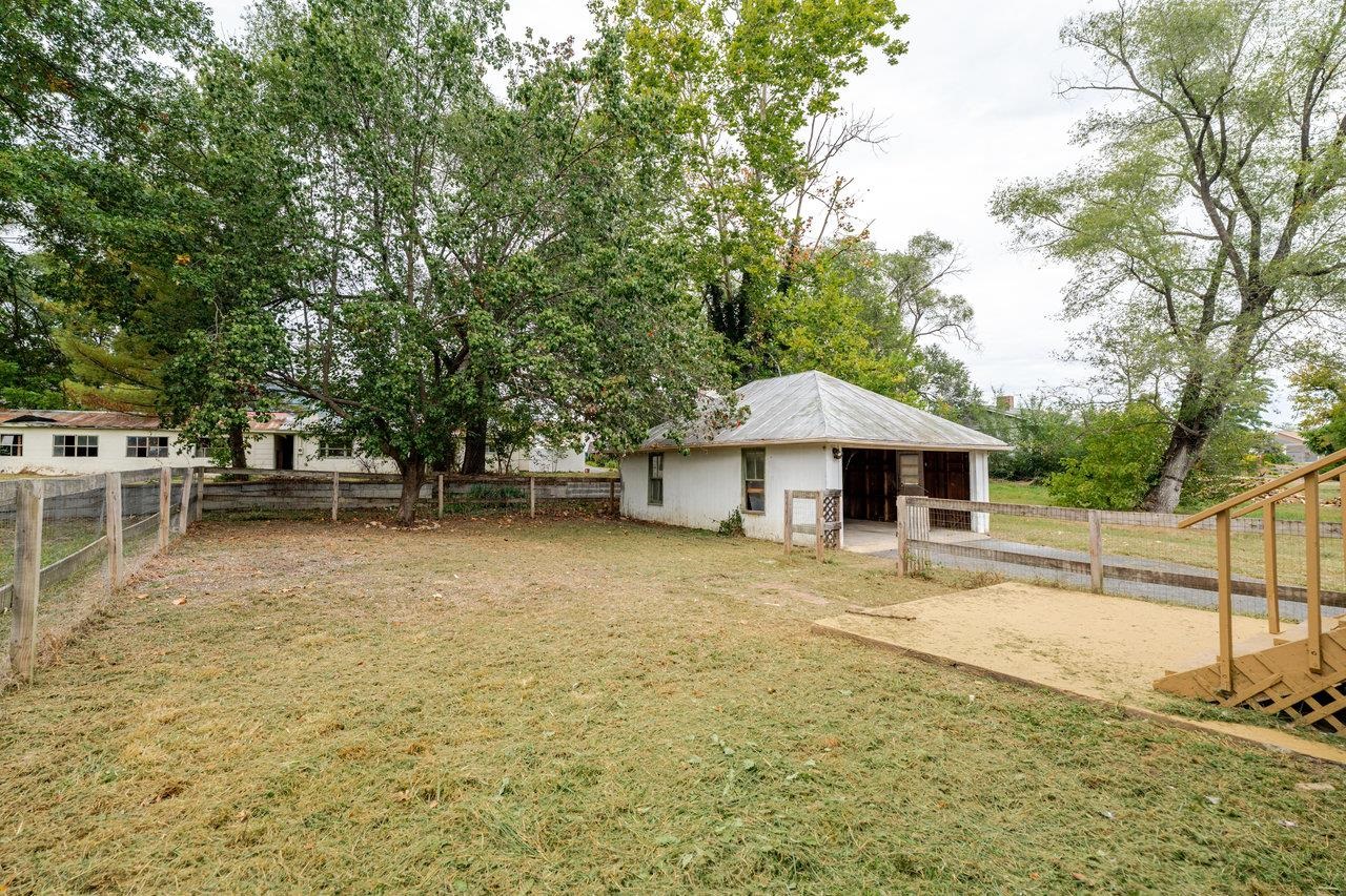 9571 Town Hall Road McGaheysville, VA 22840 - Photo 55 of 66 a backyard of a house with table and chairs