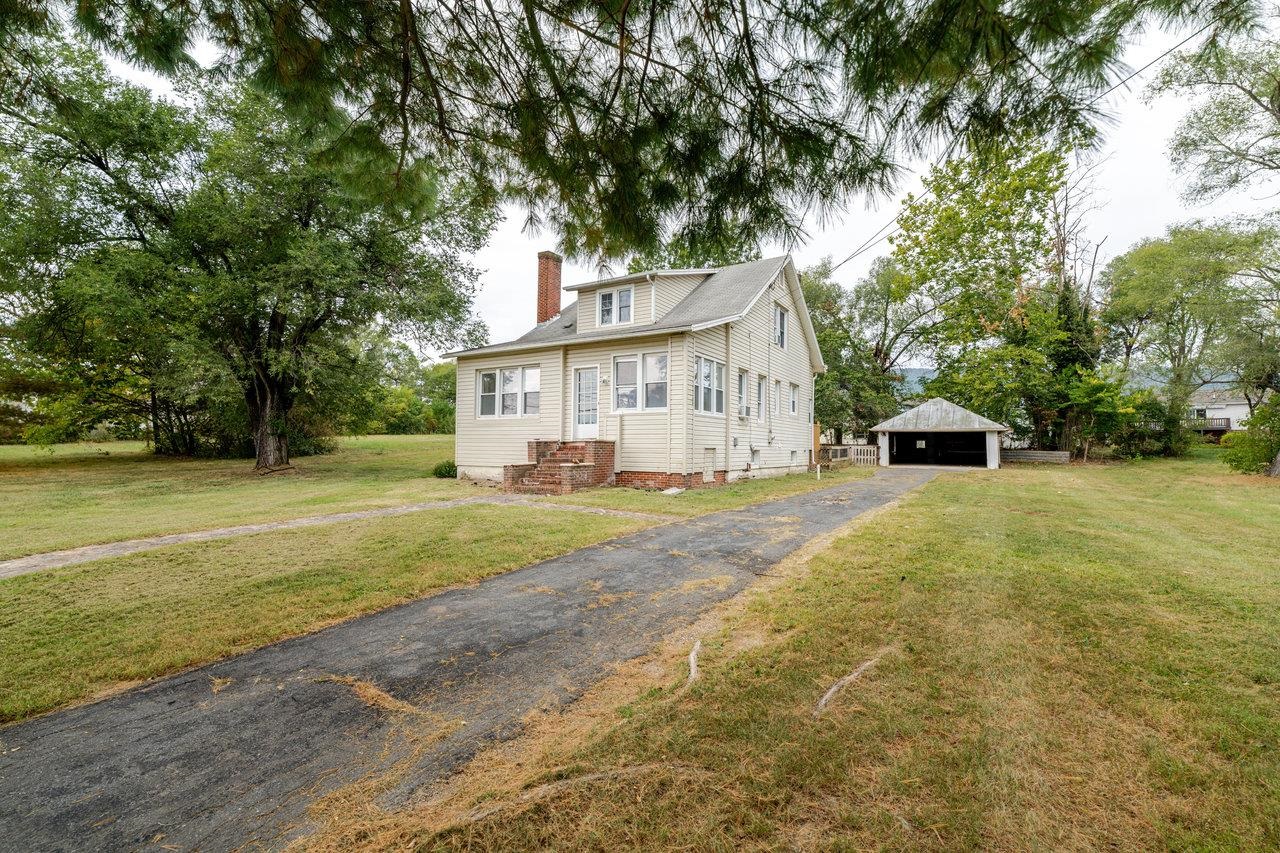 9571 Town Hall Road McGaheysville, VA 22840 - Photo 60 of 66 a front view of a house with garden