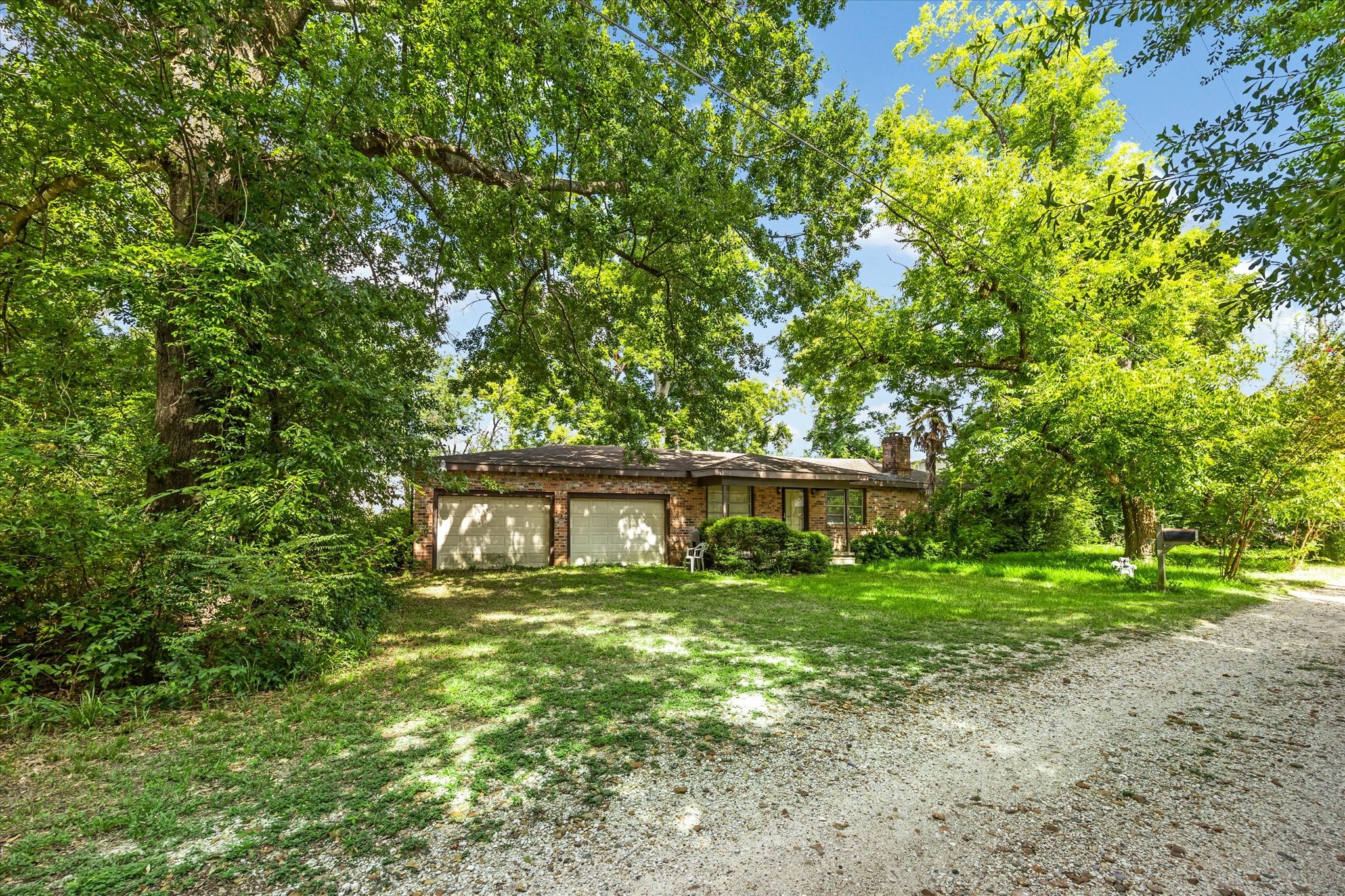 616 Spring Cypress Road Spring, TX 77373 - Photo 3 of 6 a house view with a garden space