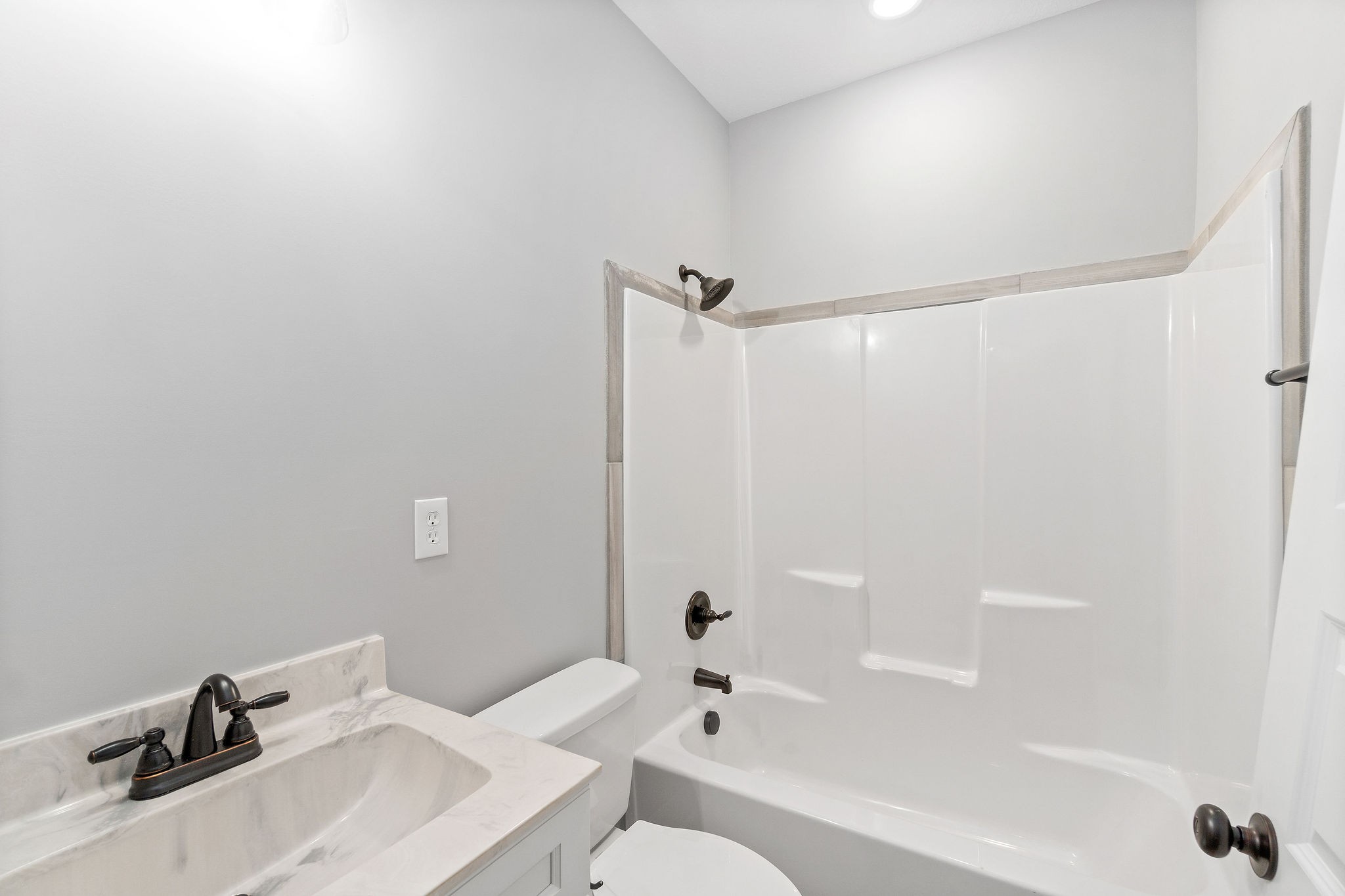 2790 Russell Road Palmyra, TN 37142 - Photo 20 of 31 a bathroom with a sink toilet and shower