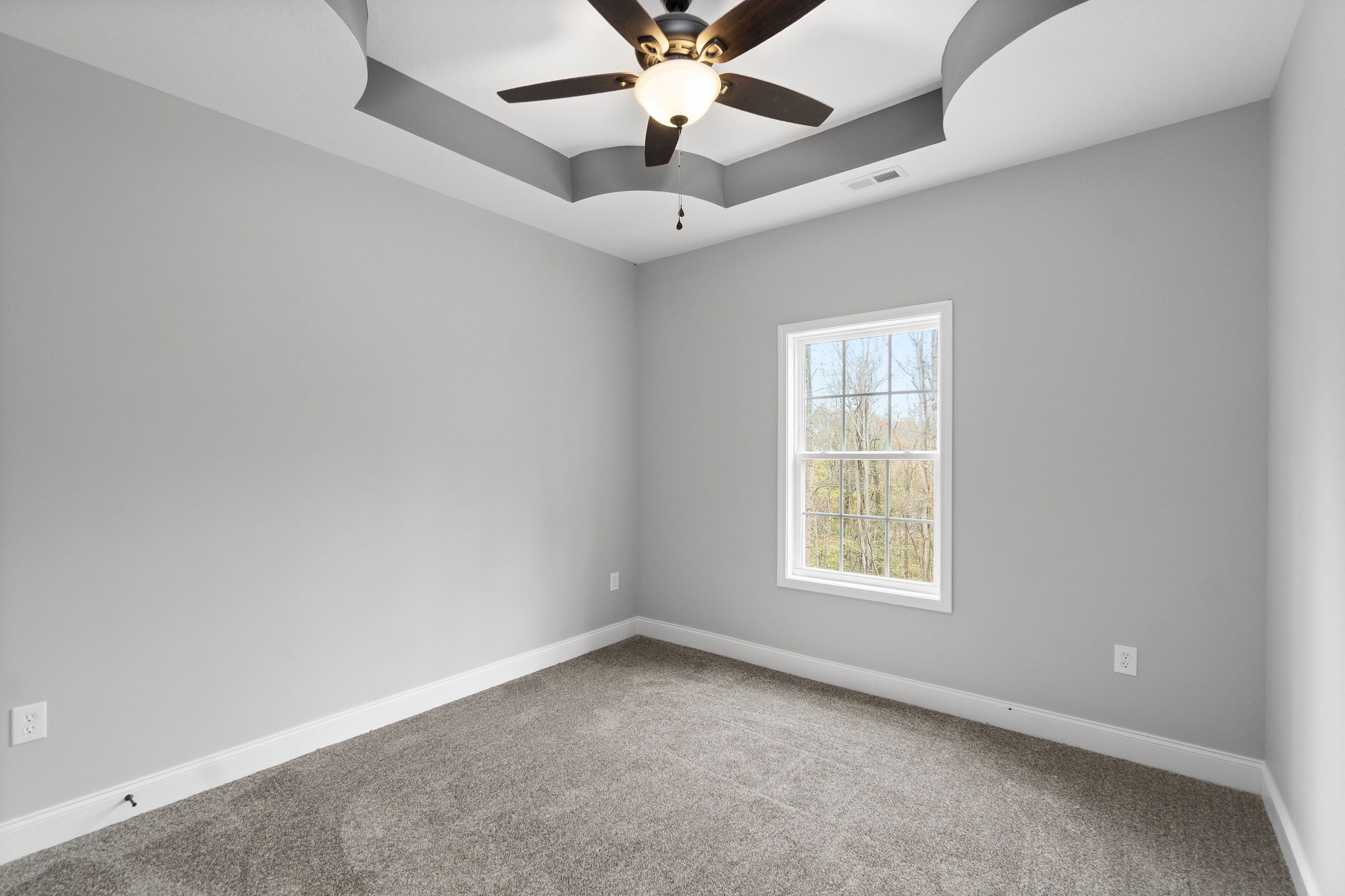 2790 Russell Road Palmyra, TN 37142 - Photo 21 of 31 an empty room with a window and a fan