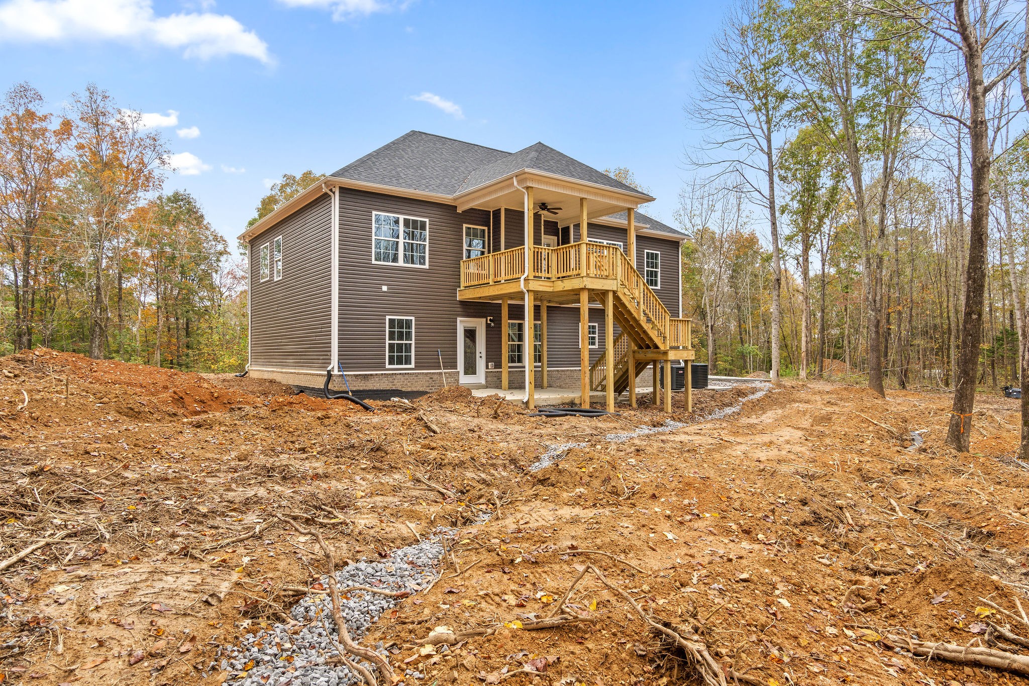 2790 Russell Road Palmyra, TN 37142 - Photo 9 of 31 a front view of a house with a yard
