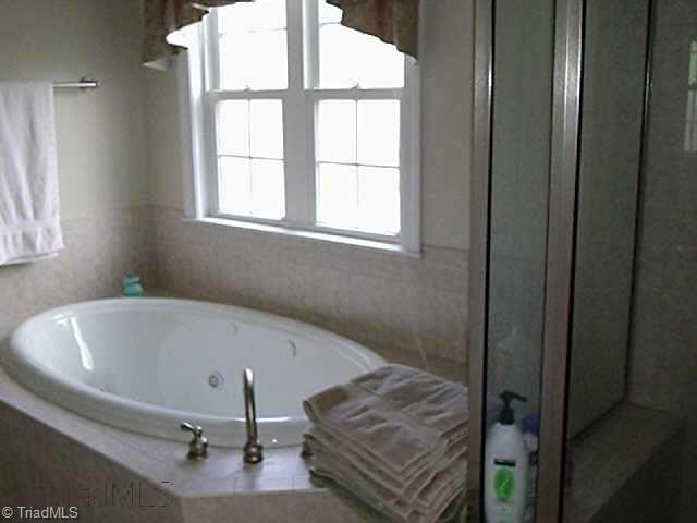 301 Morning Glory Road Madison, NC 27025 - Photo 6 of 9 Other. MASTER BATH - EXCELLENT TILE WORK - SPA TUB + SEP GLASS SHOWER