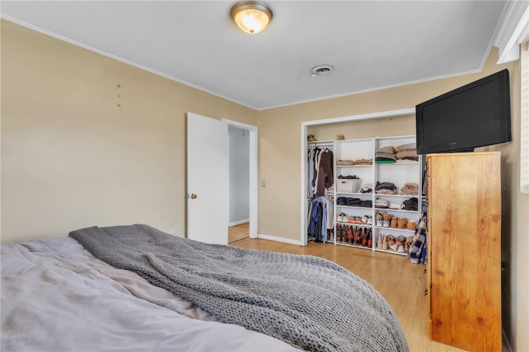 139 Louise Drive Pendleton, SC 29670 - Photo 14 of 26 This spacious bedroom offers an organized closet system and ample natural light.