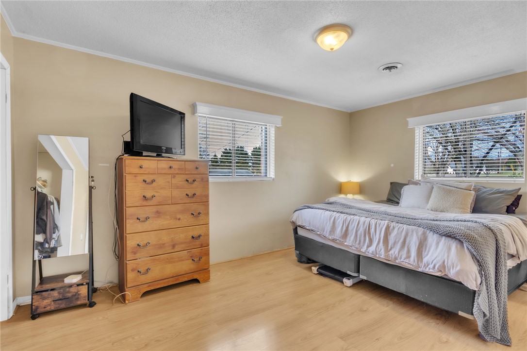 139 Louise Drive Pendleton, SC 29670 - Photo 15 of 26 This inviting bedroom offers comfort and a tranquil retreat for relaxation.