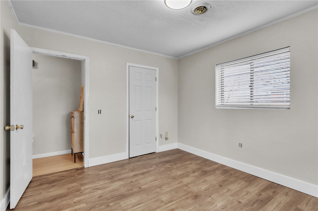 139 Louise Drive Pendleton, SC 29670 - Photo 18 of 26 This bright room features durable flooring and ample natural light, ideal for versatile living.