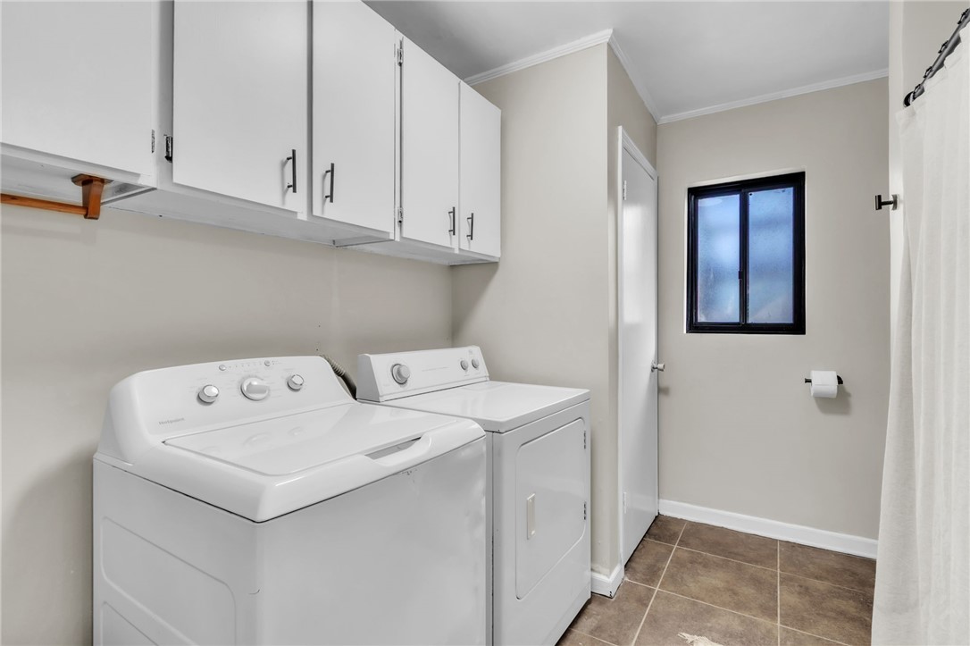 139 Louise Drive Pendleton, SC 29670 - Photo 20 of 26 This functional space features a washer and dryer, simplifying household tasks.