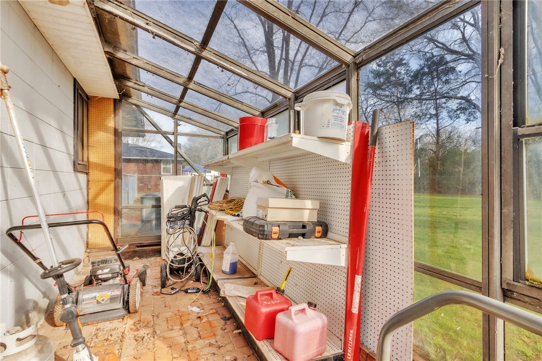 139 Louise Drive Pendleton, SC 29670 - Photo 21 of 26 This bright sunroom offers a versatile space with ample natural light.