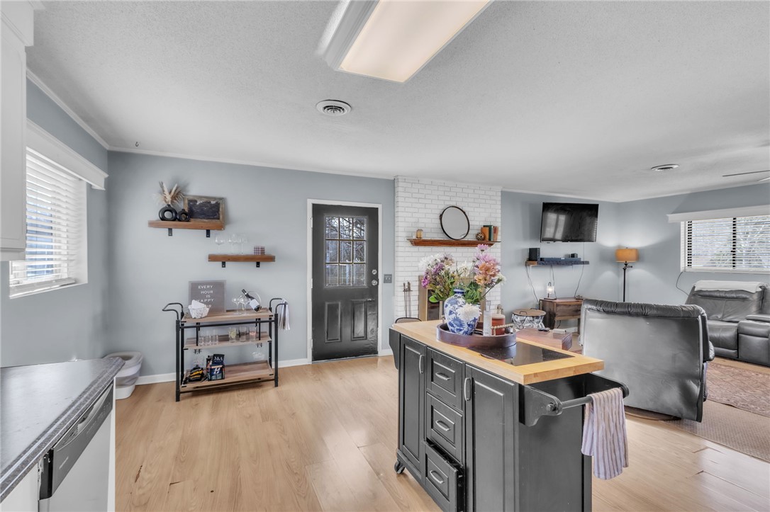 139 Louise Drive Pendleton, SC 29670 - Photo 10 of 26 This living space seamlessly blends living and dining, offering both comfort and practicality.