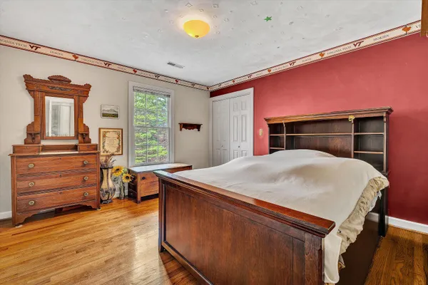 a room with closet and furniture