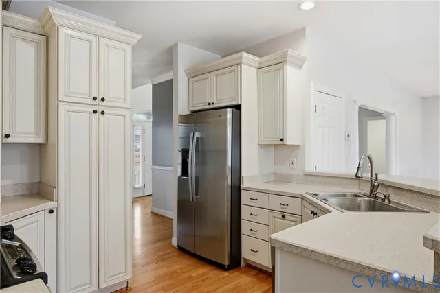 a view of an empty room with a ceiling fan