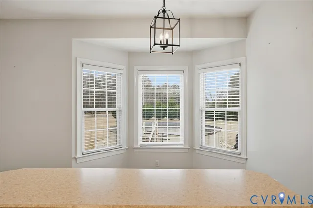 a bathroom with a bathtub and a sink