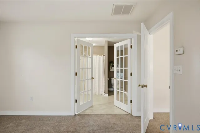 a bathroom with a sink toilet and mirror