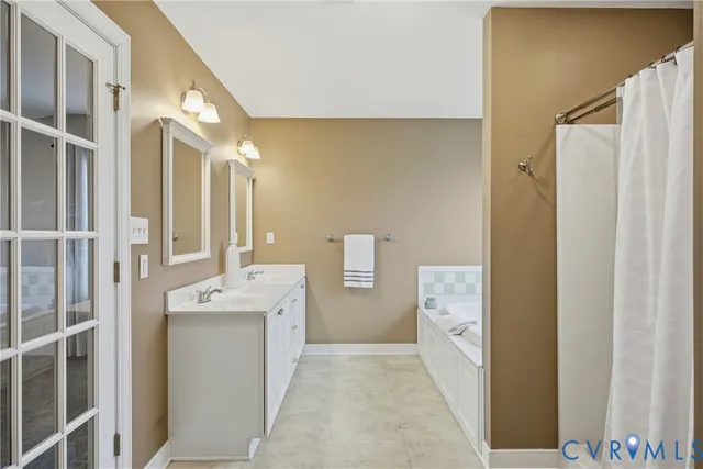 a bathroom with a shower curtain and a curtain