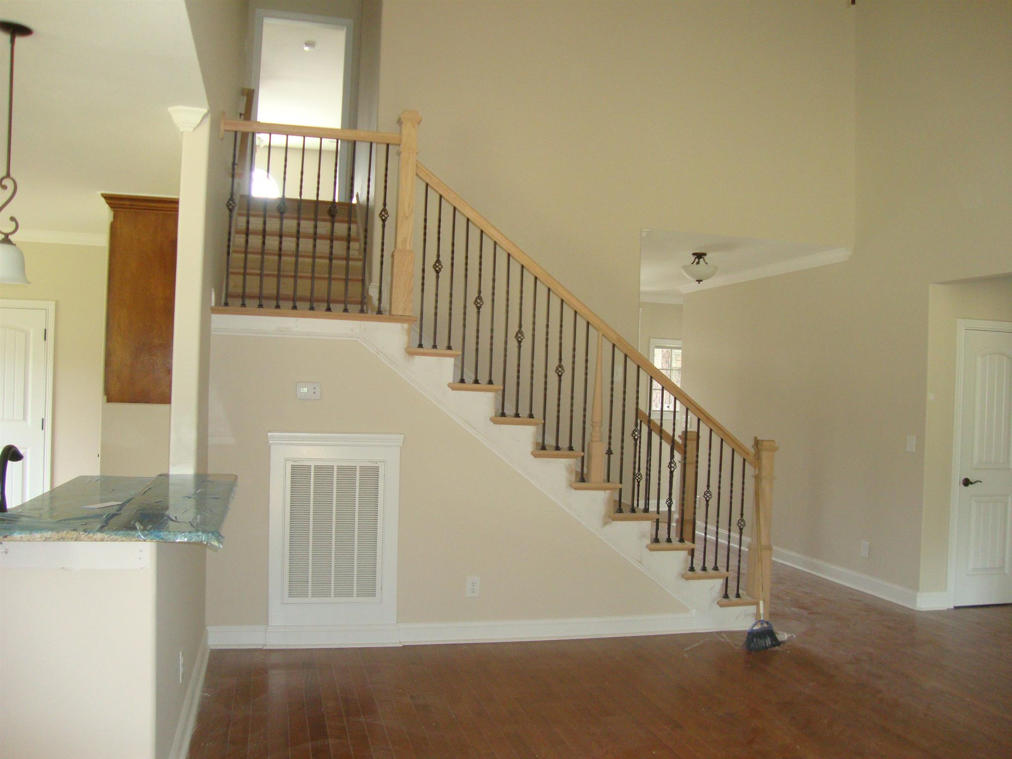 3596 Drake Road Adams, TN 37010 - Photo 8 of 25 a view of entryway and hall with wooden floor