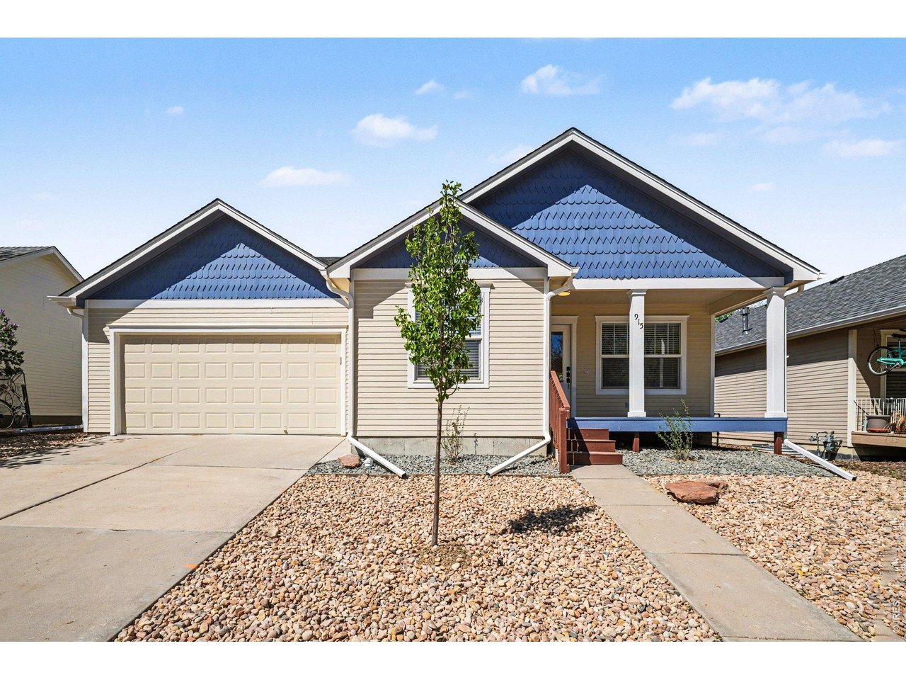 915 Pear Street Fort Collins, CO 80521 - Photo 1 of 20 a house with trees in the background