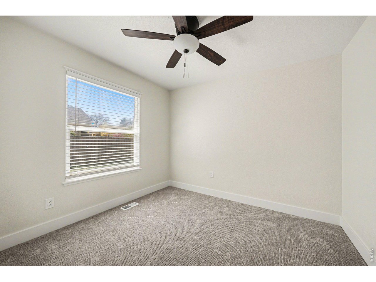 915 Pear Street Fort Collins, CO 80521 - Photo 11 of 20 a view of an empty room with a window