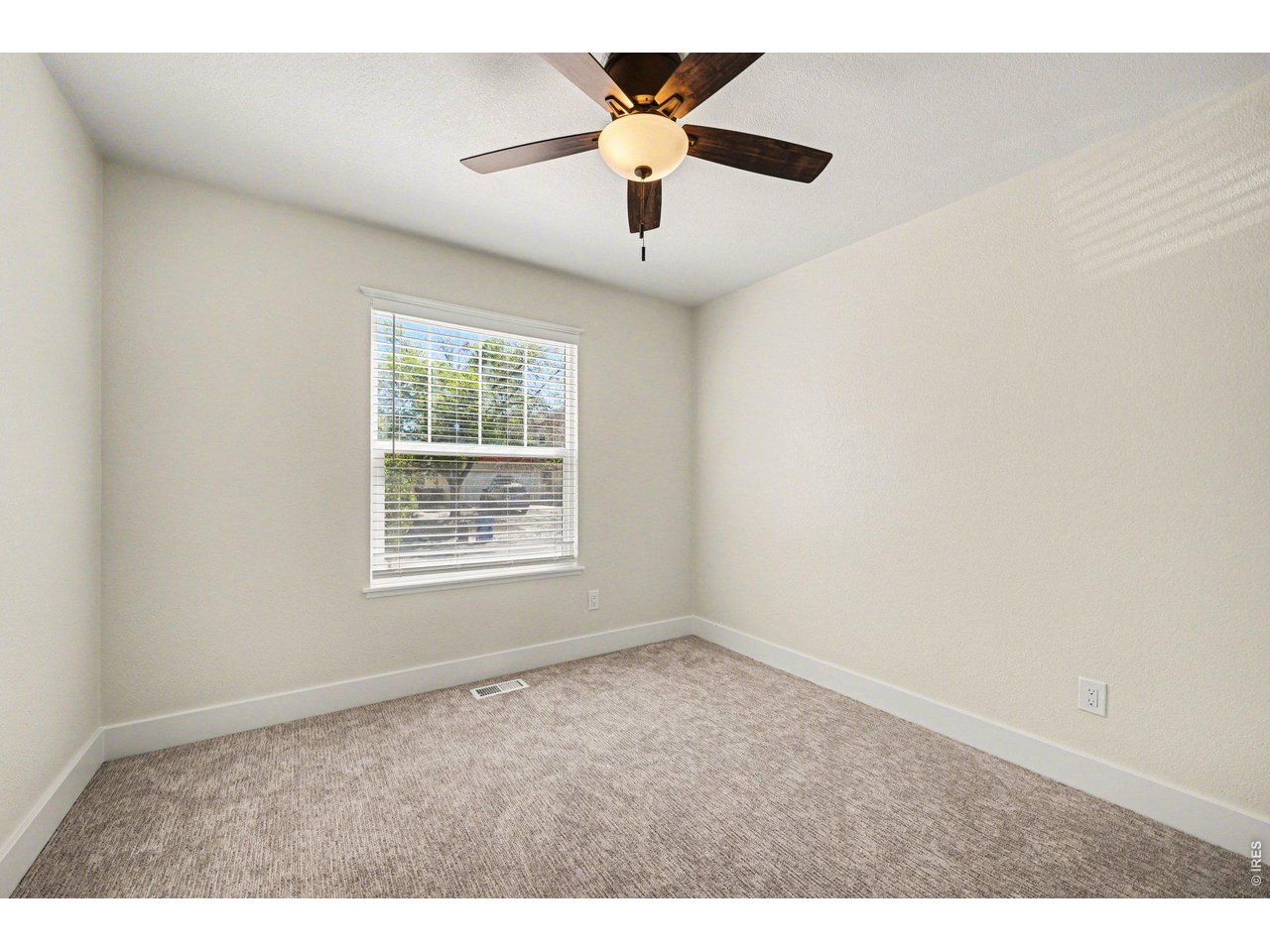 915 Pear Street Fort Collins, CO 80521 - Photo 12 of 20 a view of an empty room with a window