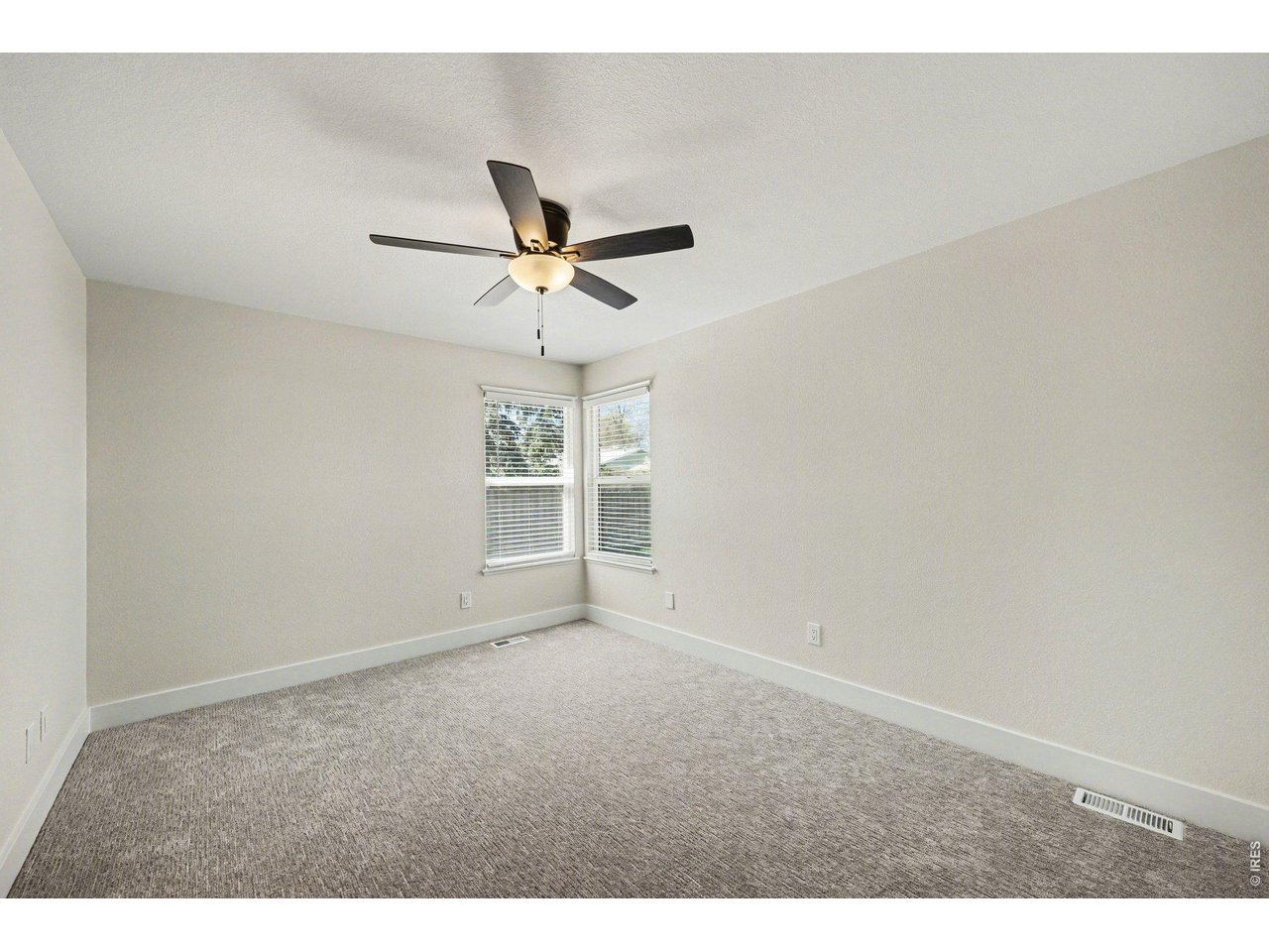 915 Pear Street Fort Collins, CO 80521 - Photo 14 of 20 a view of an empty room with a window