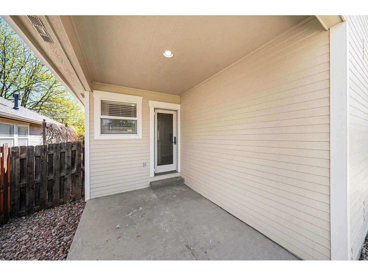 915 Pear Street Fort Collins, CO 80521 - Photo 18 of 20 a view of an empty room with wooden floor
