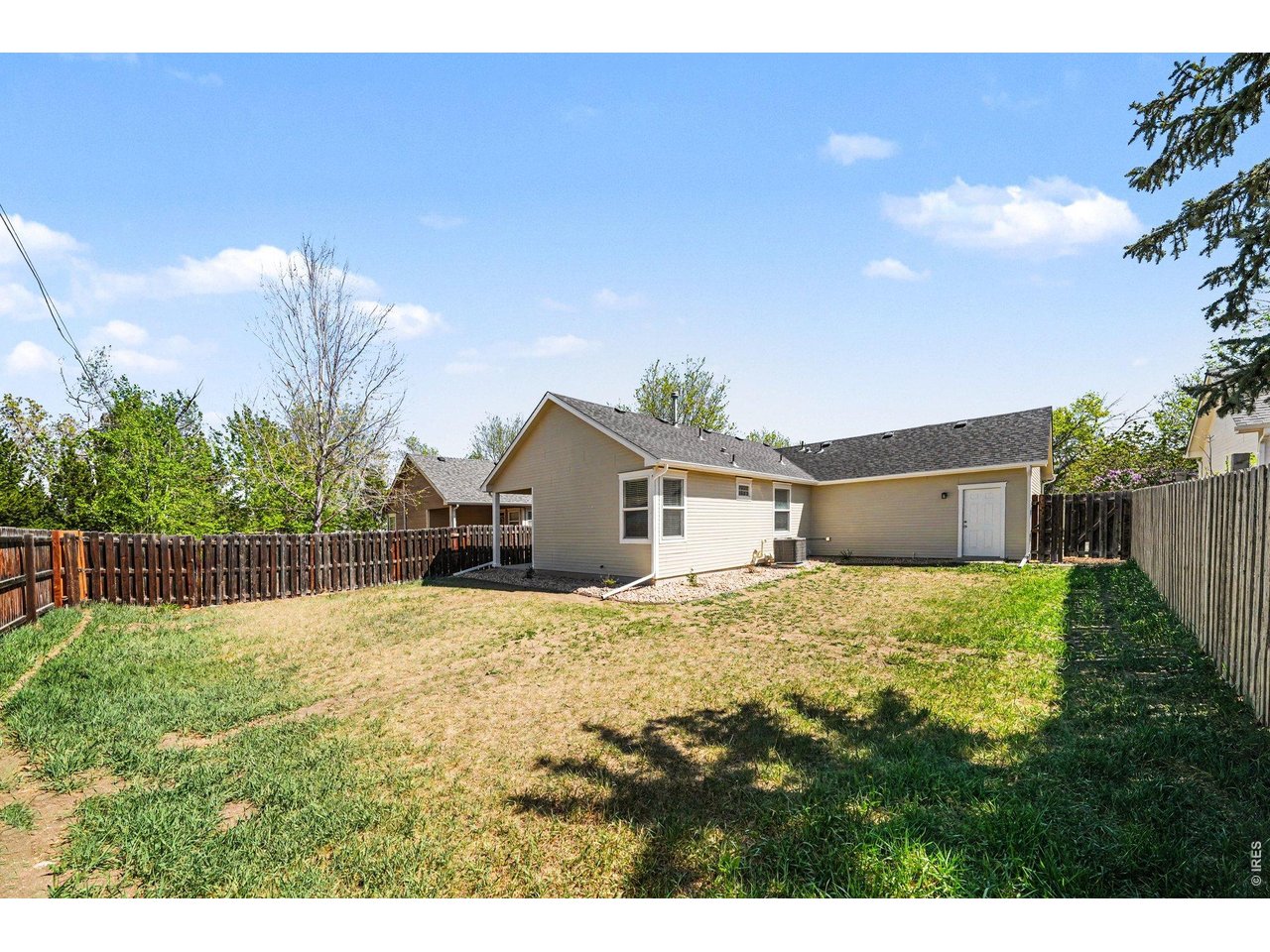 915 Pear Street Fort Collins, CO 80521 - Photo 19 of 20 a house view with a backyard space