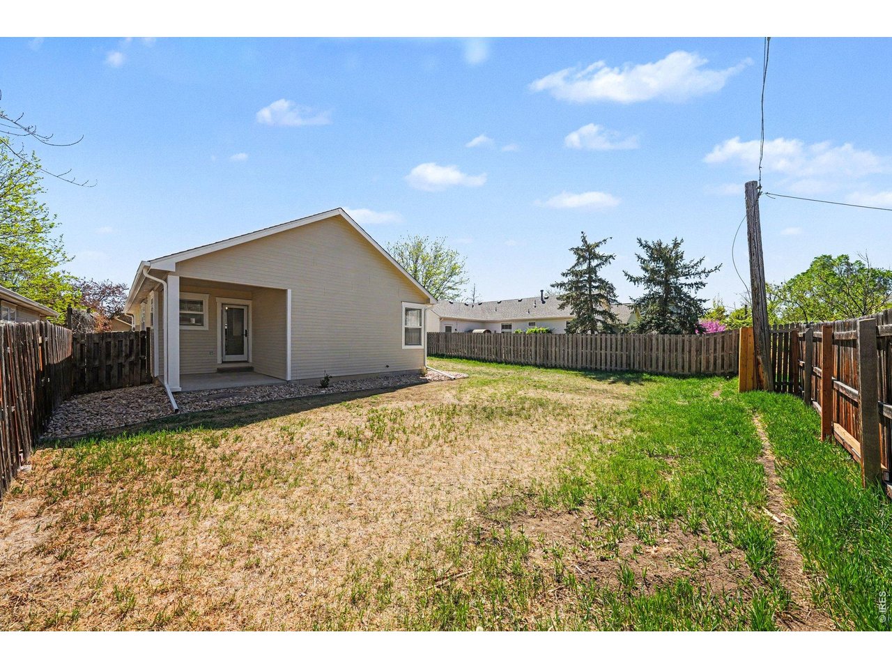 915 Pear Street Fort Collins, CO 80521 - Photo 20 of 20 a backyard of a house