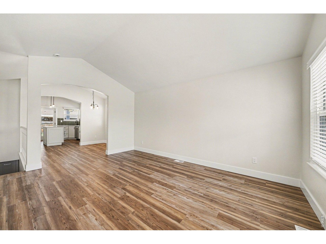 915 Pear Street Fort Collins, CO 80521 - Photo 5 of 20 a view of empty room with wooden floor
