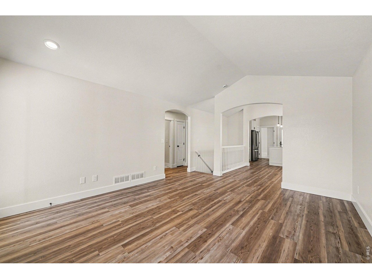 915 Pear Street Fort Collins, CO 80521 - Photo 6 of 20 a view of room with wooden floor
