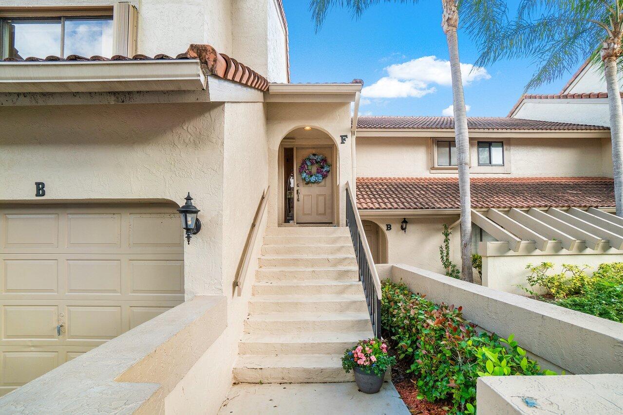 5630 Coach House Circle, Unit F Boca Raton, FL 33486 - Photo 4 of 34 FRONT ENTRANCE
