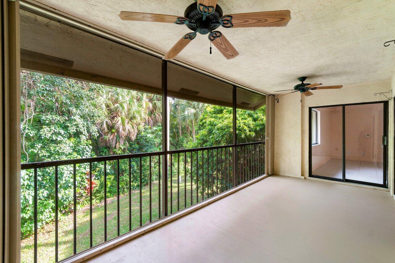 5630 Coach House Circle, Unit F Boca Raton, FL 33486 - Photo 9 of 34 BALCONY ACCESS OFF PRIMARY