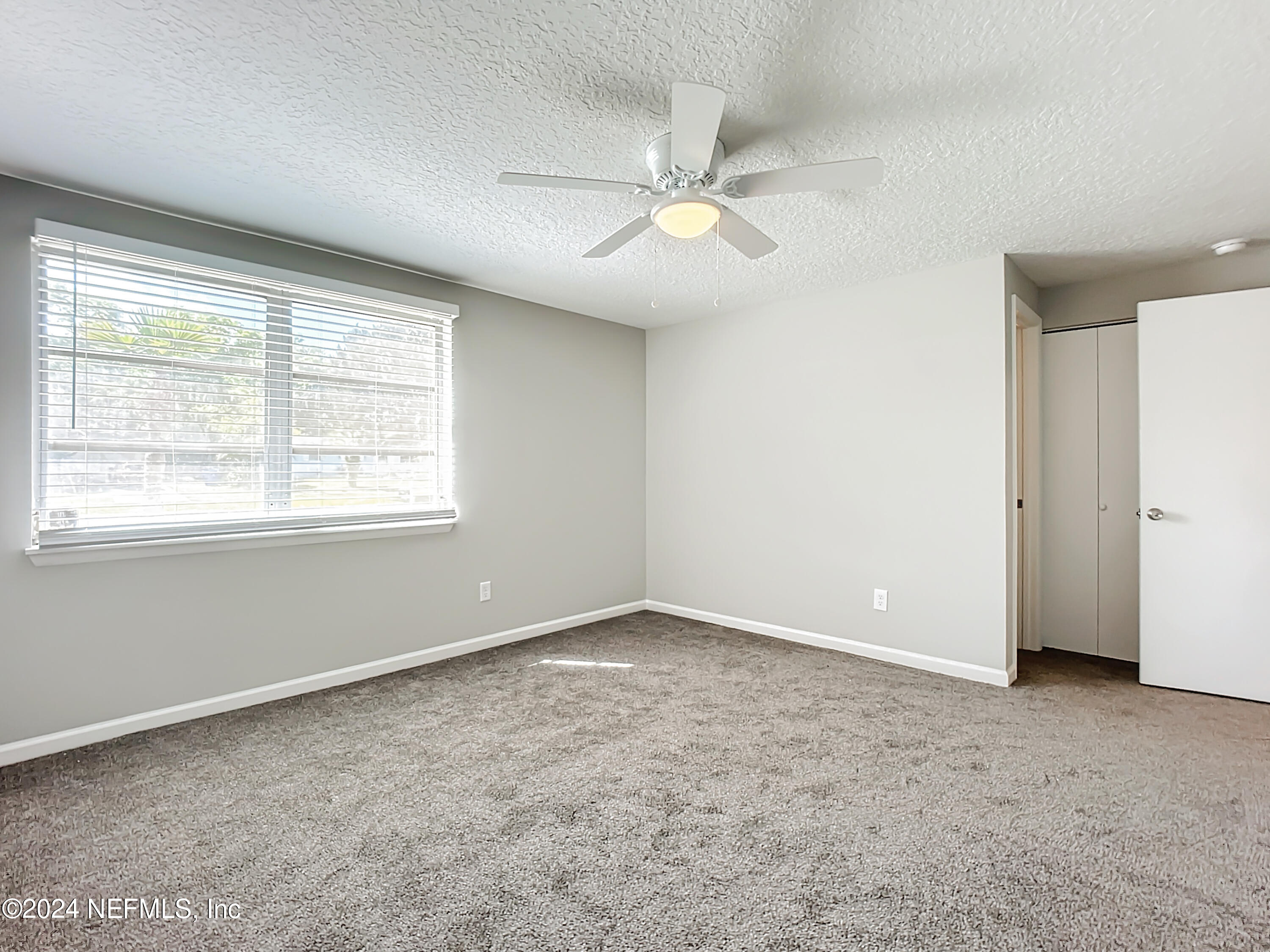242 Shores Boulevard St. Augustine, FL 32086 - Photo 21 of 42 a view of an empty room with a window