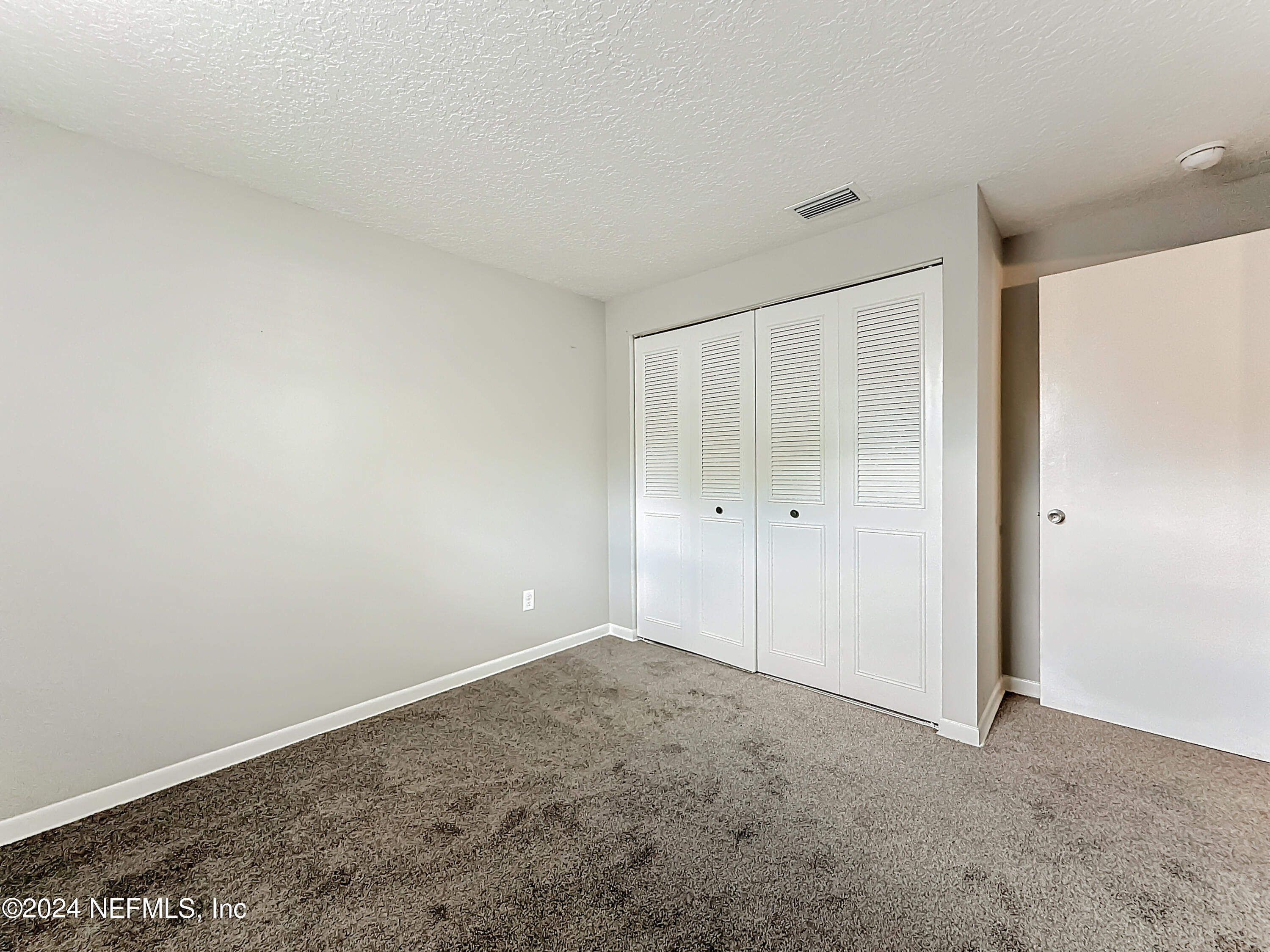 242 Shores Boulevard St. Augustine, FL 32086 - Photo 26 of 42 a view of an empty room