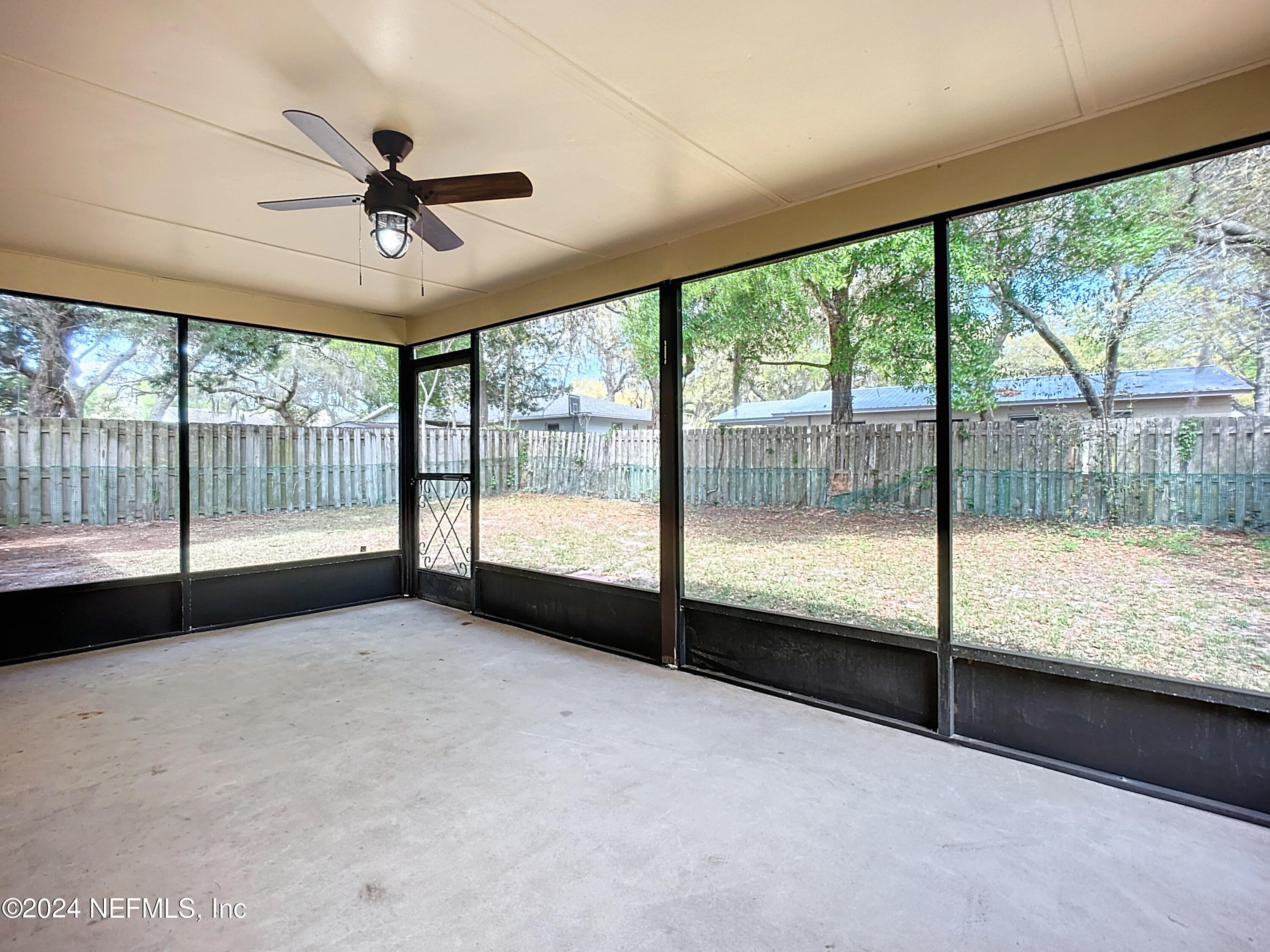 242 Shores Boulevard St. Augustine, FL 32086 - Photo 32 of 42 a view of an empty room and window