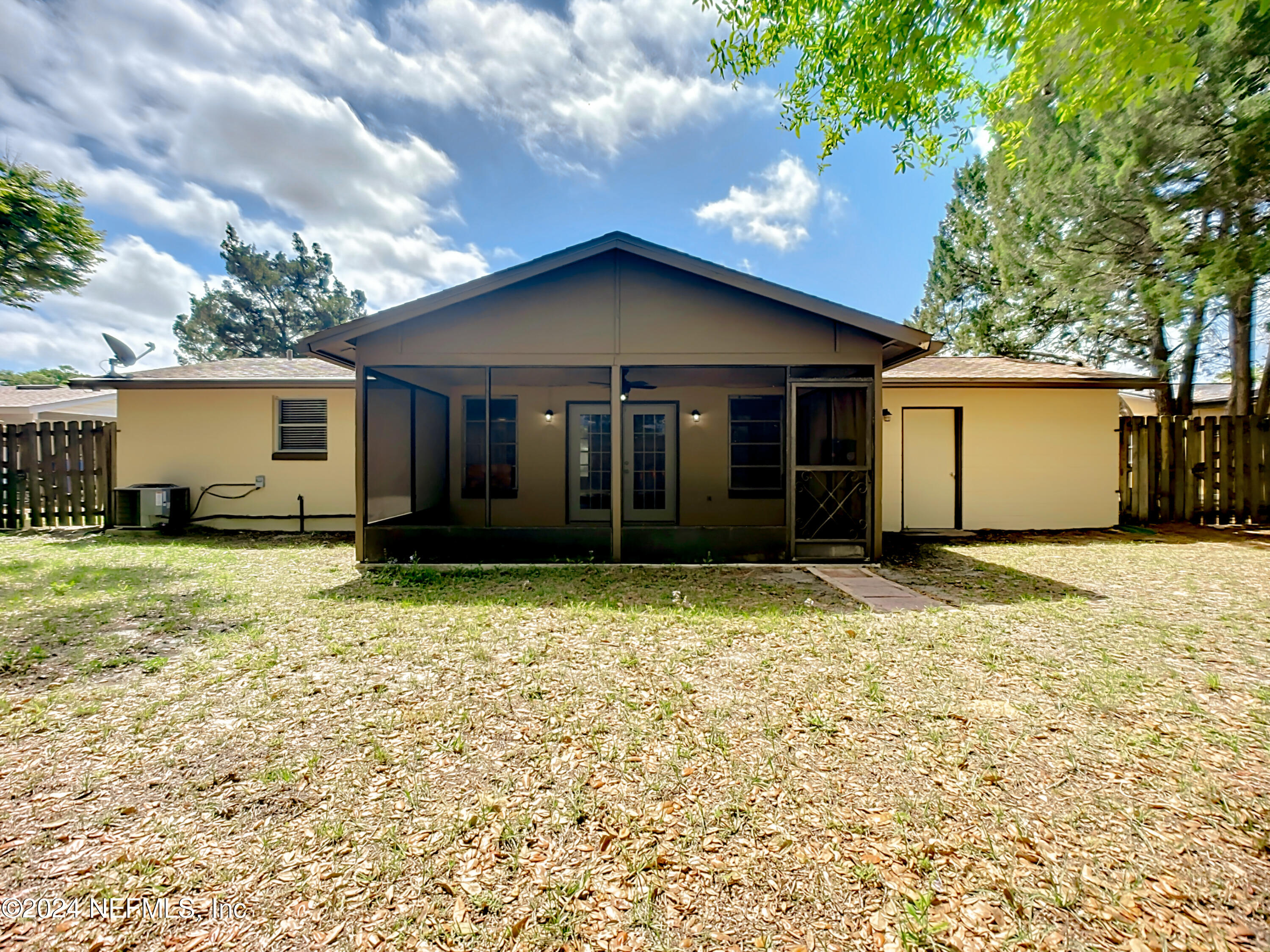 242 Shores Boulevard St. Augustine, FL 32086 - Photo 35 of 42 a house with yard in front of it