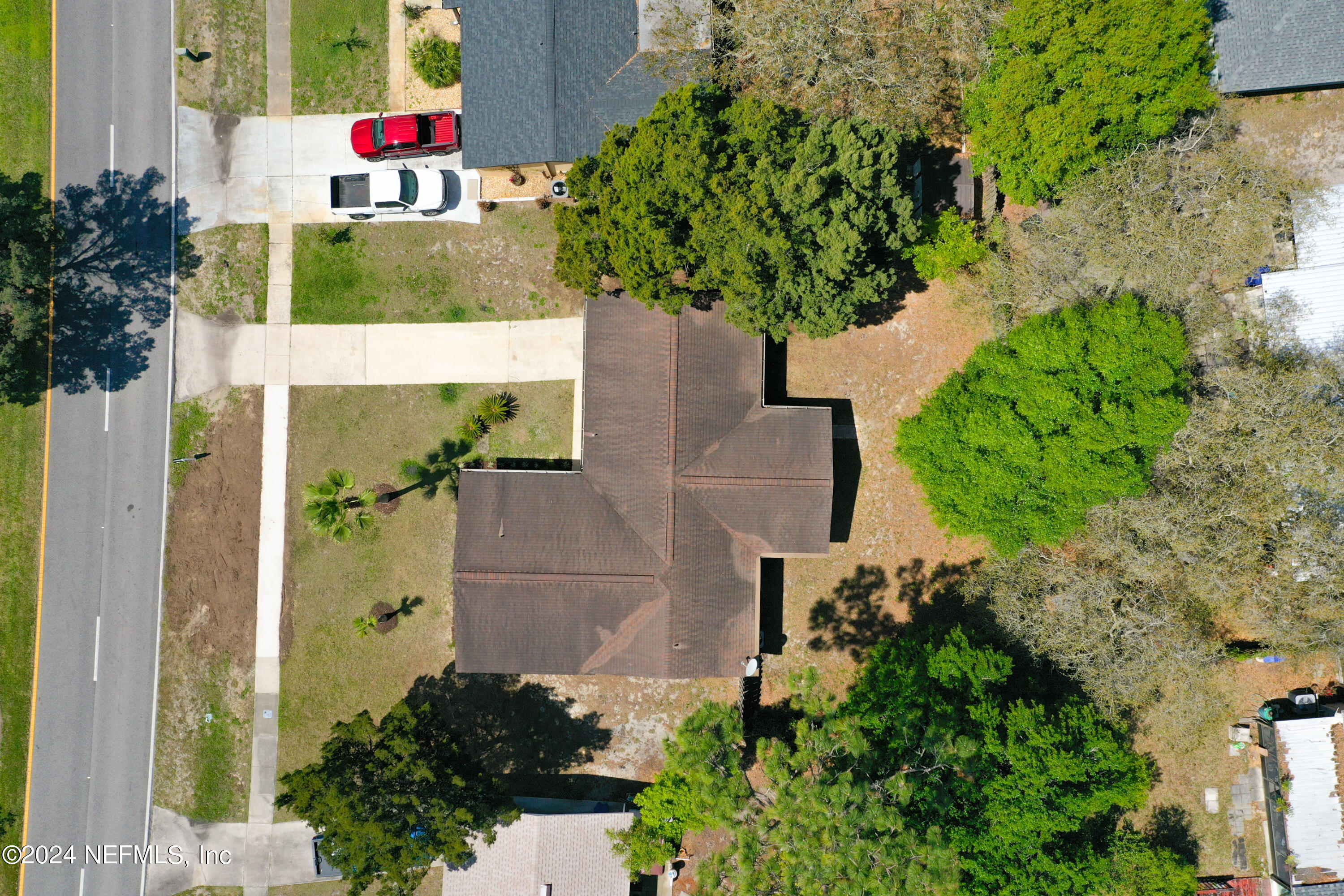 242 Shores Boulevard St. Augustine, FL 32086 - Photo 36 of 42 an aerial view of a house with a yard