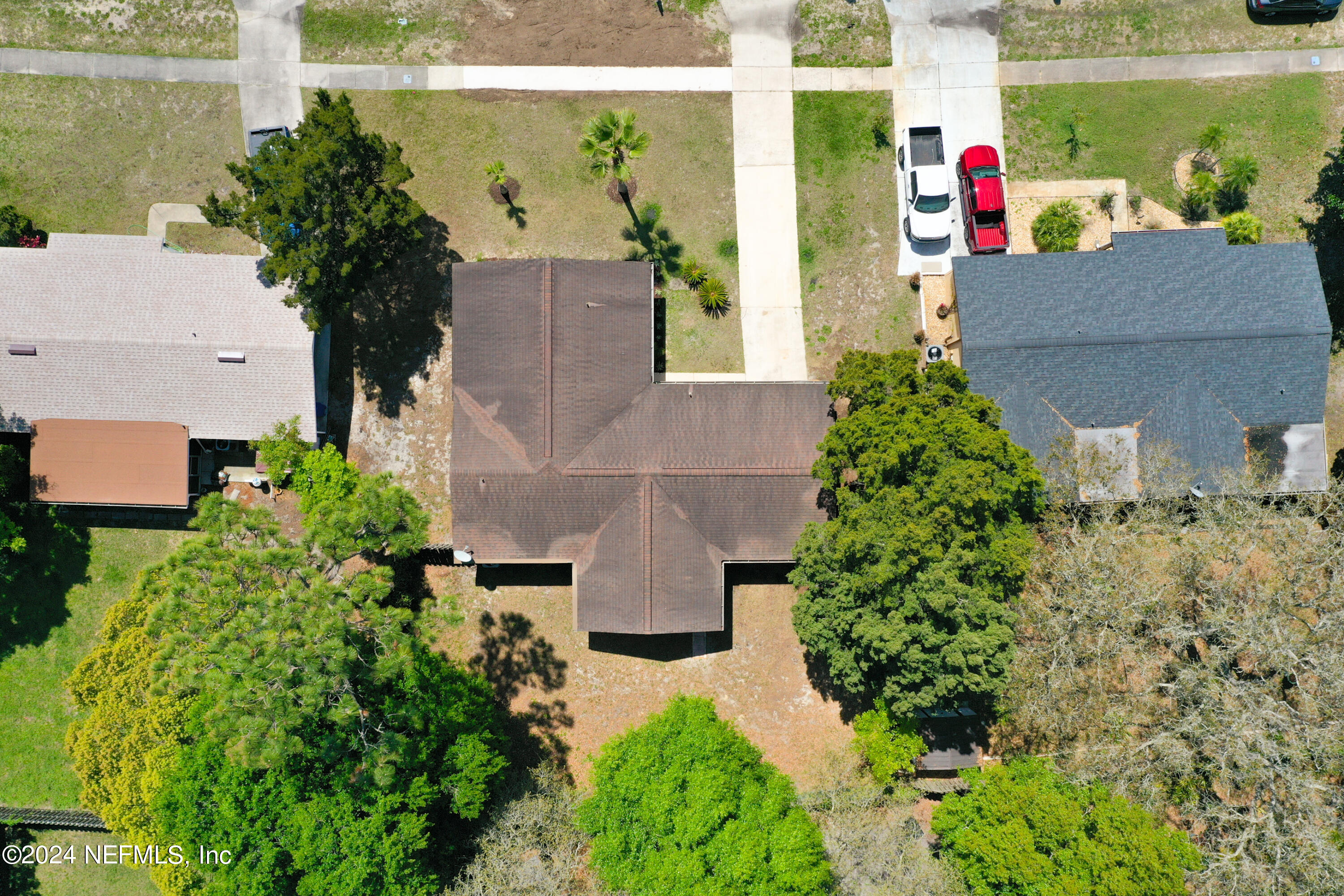 242 Shores Boulevard St. Augustine, FL 32086 - Photo 37 of 42 an aerial view of a house with a yard