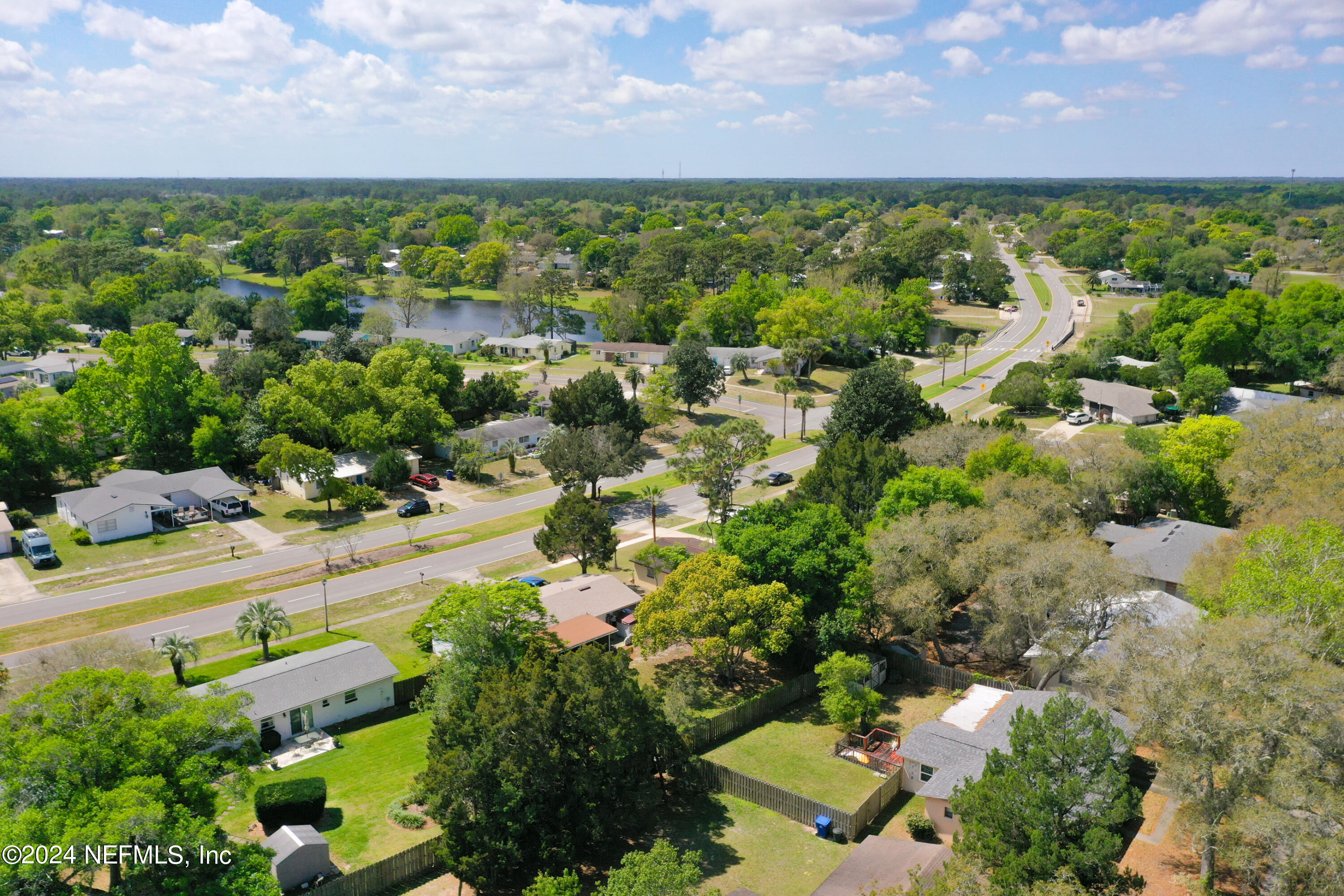 242 Shores Boulevard St. Augustine, FL 32086 - Photo 42 of 42 an aerial view of residential houses with outdoor space and trees
