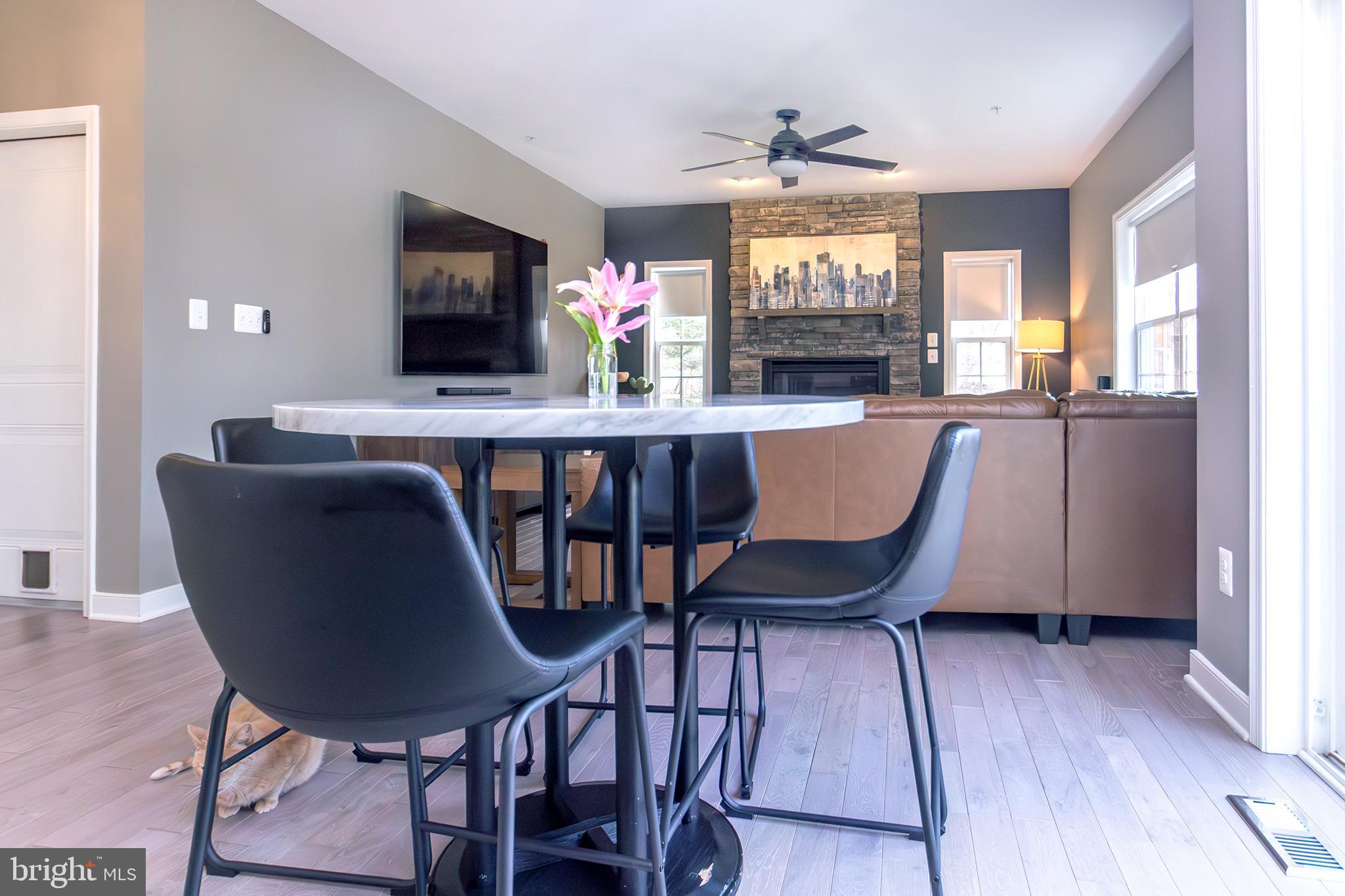 1362 Rock Ridge Road Jarrettsville, MD 21084 - Photo 14 of 50 a view of a dining room with furniture window and wooden floor