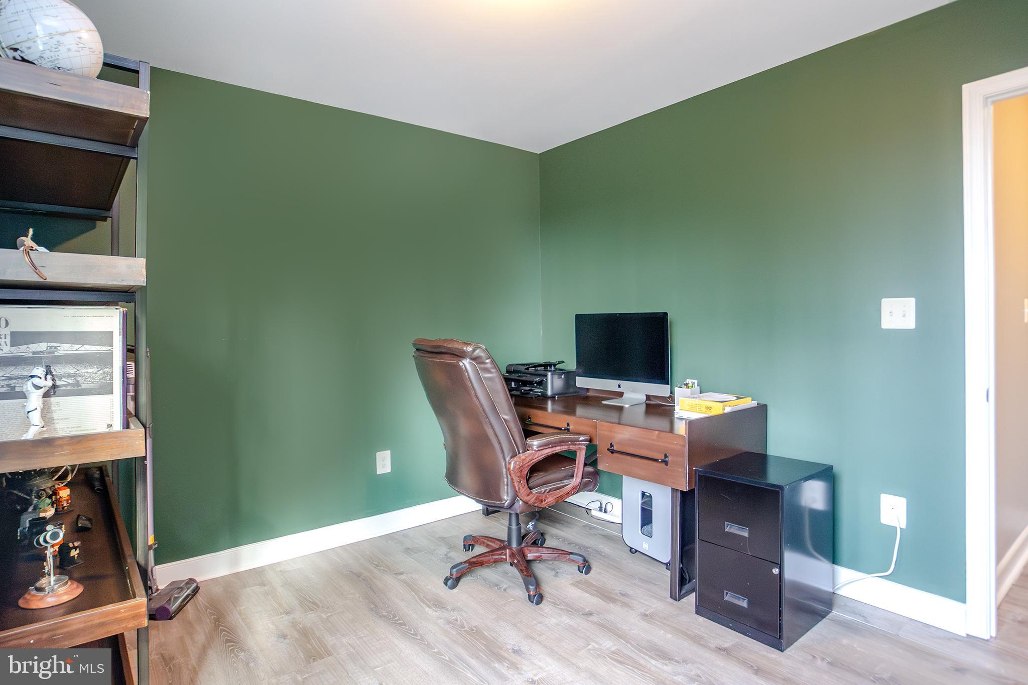 1362 Rock Ridge Road Jarrettsville, MD 21084 - Photo 32 of 50 a workspace with furniture and a wooden floor