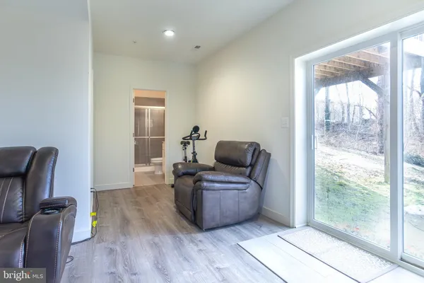 a living room with furniture and a gate