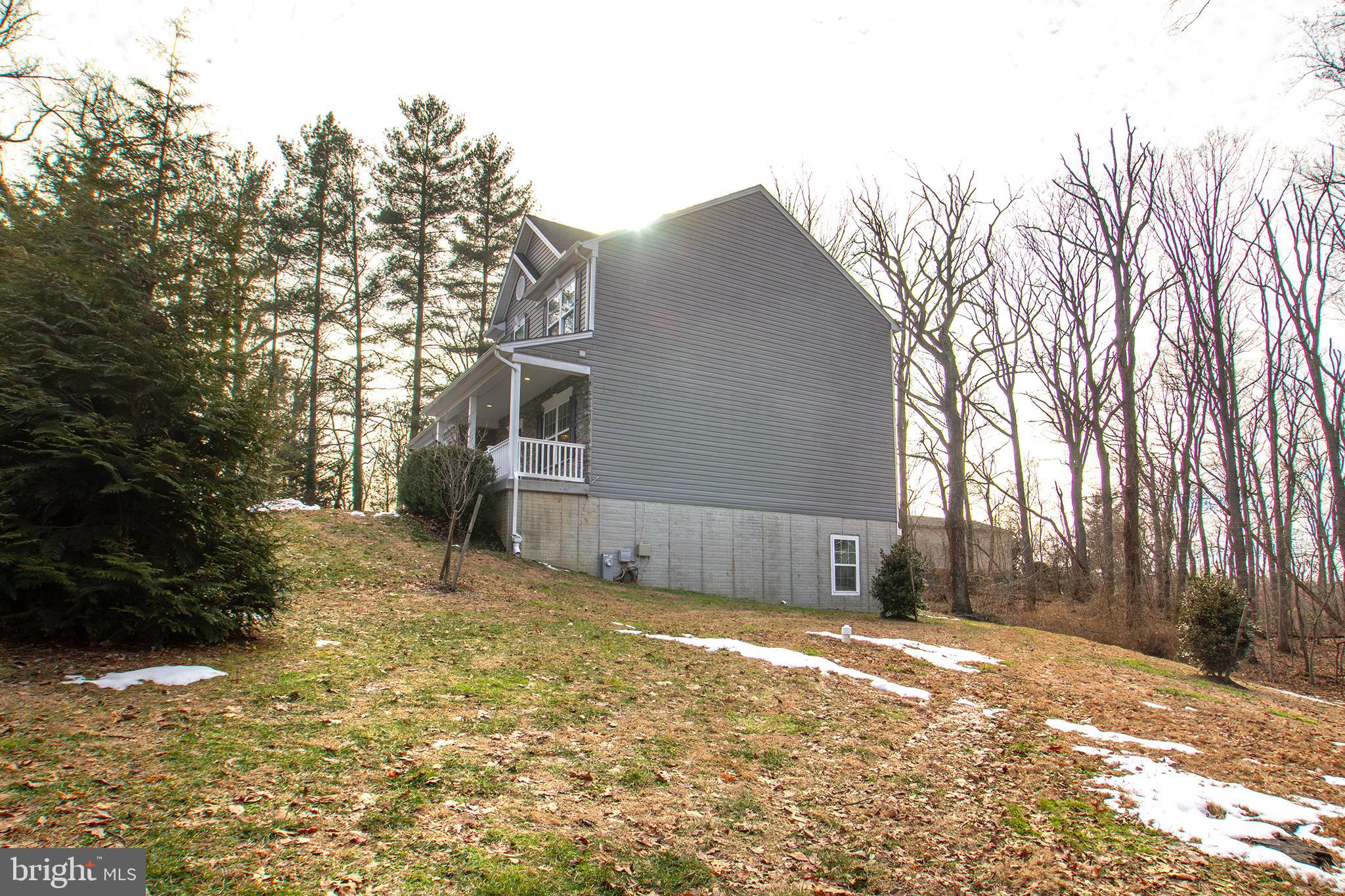 1362 Rock Ridge Road Jarrettsville, MD 21084 - Photo 44 of 50 a view of a house with a yard