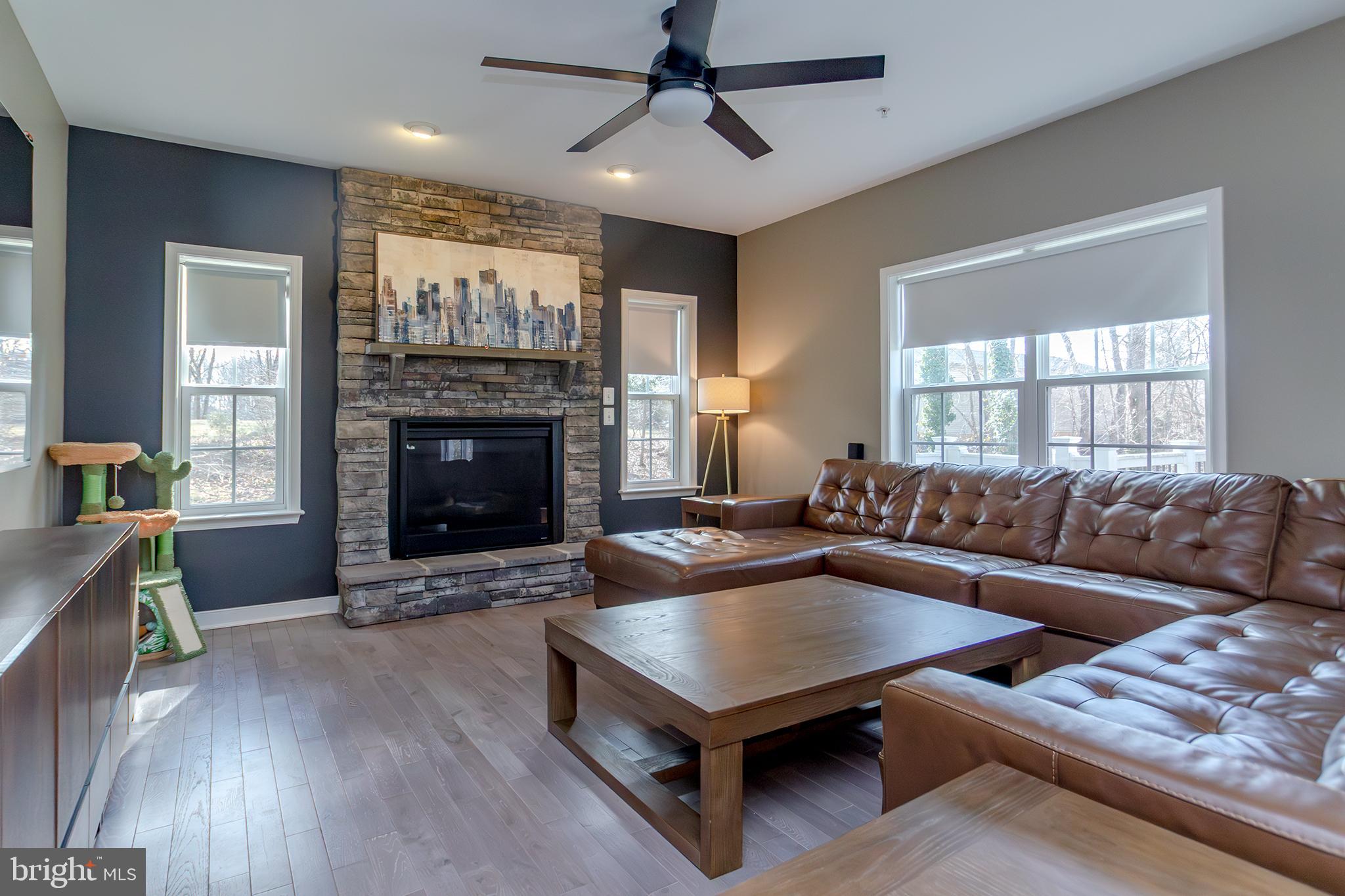 1362 Rock Ridge Road Jarrettsville, MD 21084 - Photo 8 of 50 a living room with furniture and a fireplace