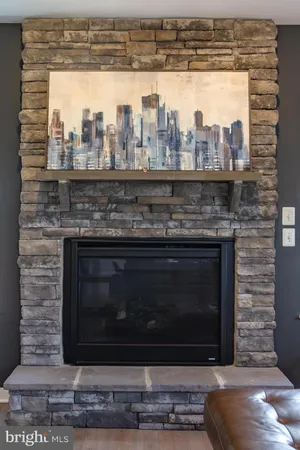 a stove top oven sitting inside of a kitchen
