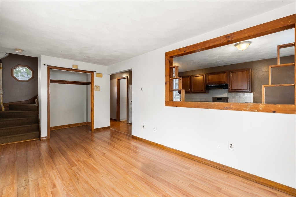 23 Logan Street Lynn, MA 01902 - Photo 12 of 27 wooden floor in a room